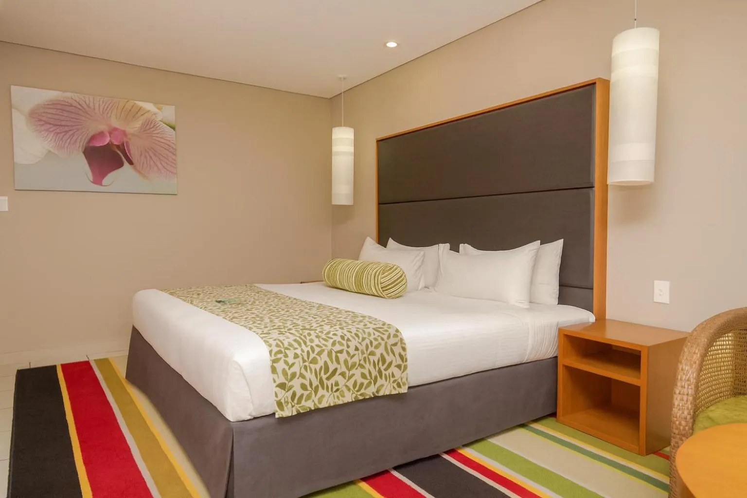 Bed in Ela Beach Hotel