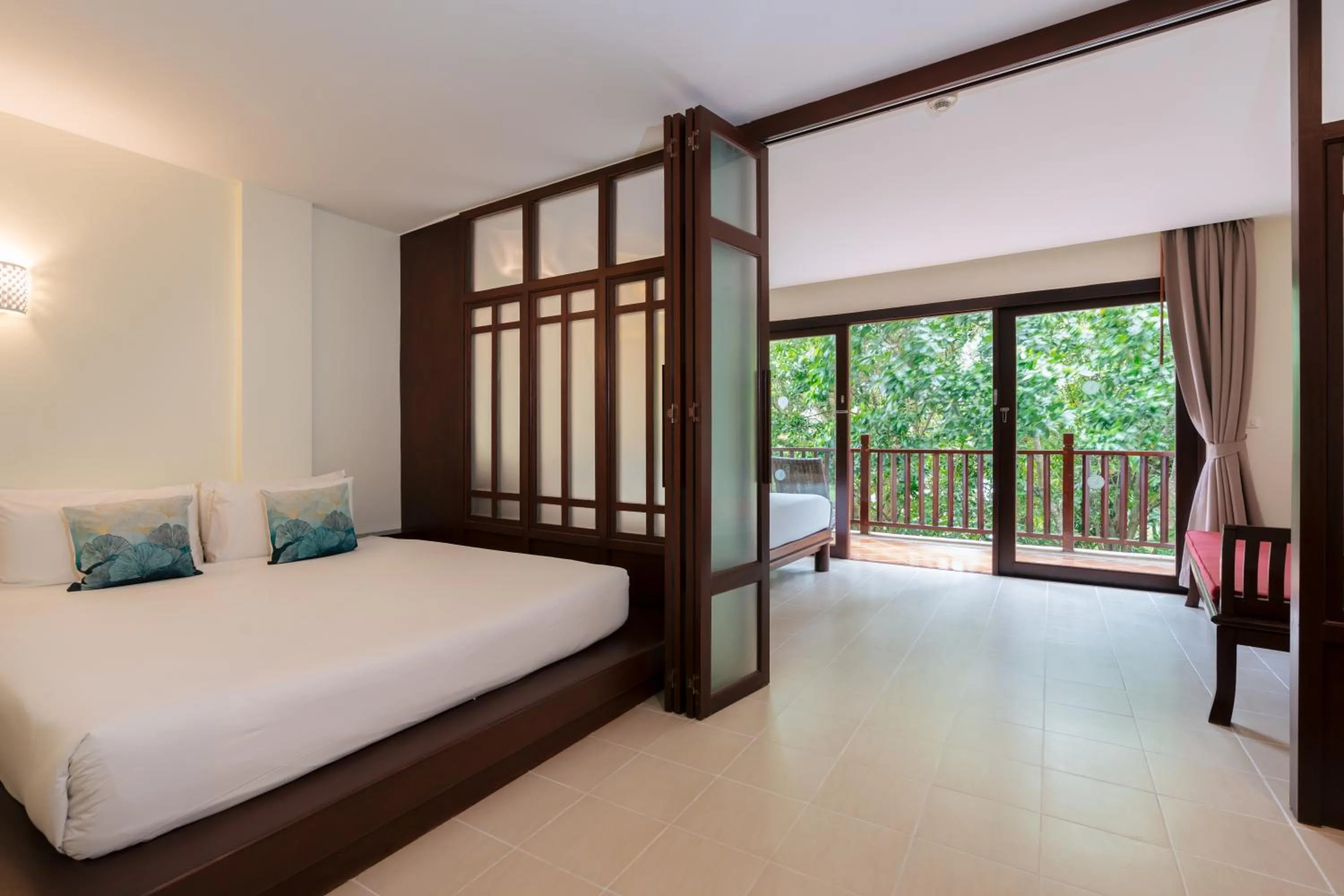 Bed in Arinara Beach Resort Phuket - SHA Extra Plus