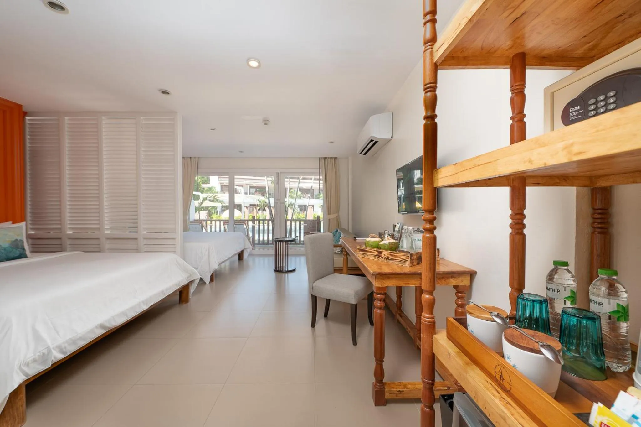 Bed in Arinara Beach Resort Phuket - SHA Extra Plus