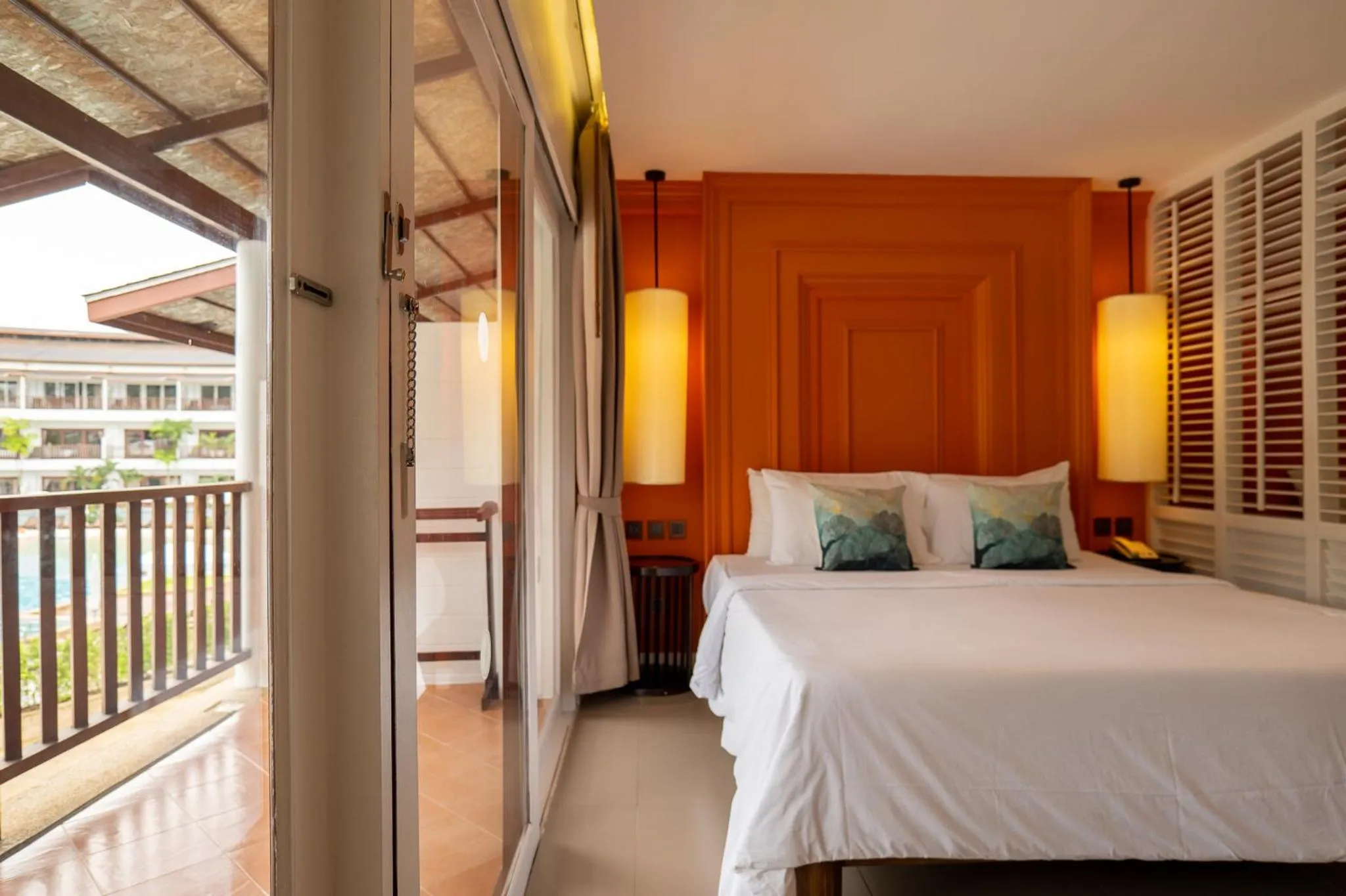 Bed in Arinara Beach Resort Phuket - SHA Extra Plus