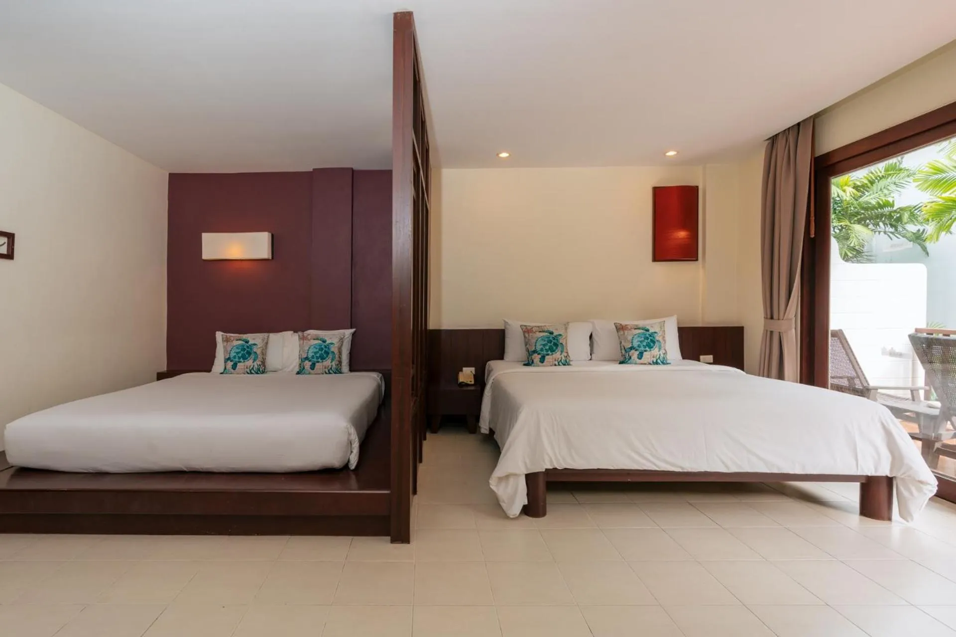 Bed in Arinara Beach Resort Phuket - SHA Extra Plus