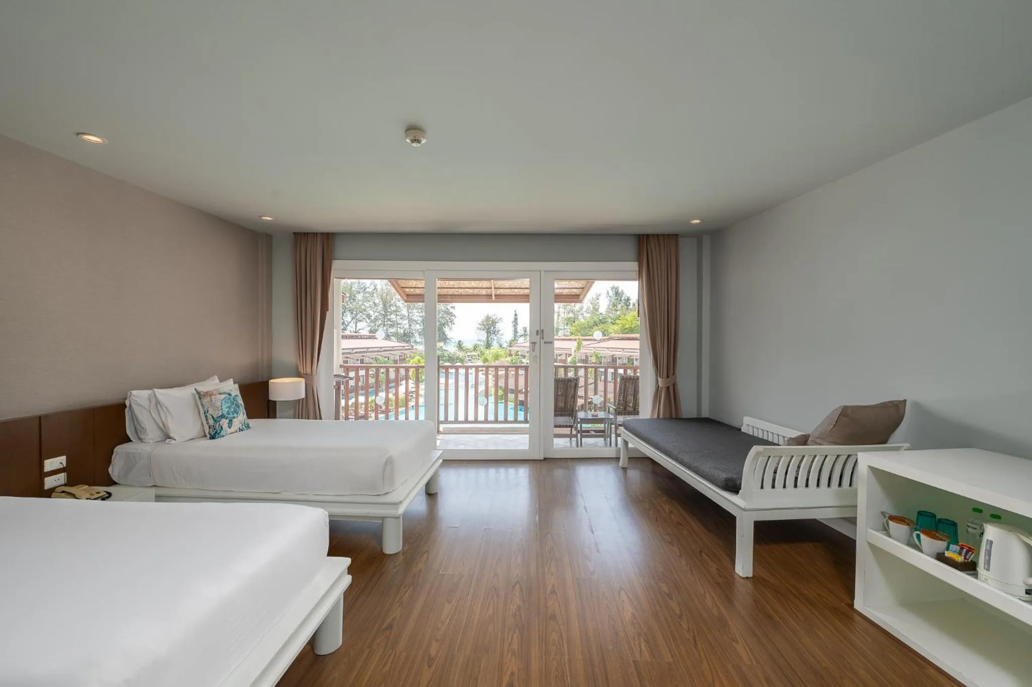 Bed in Arinara Beach Resort Phuket - SHA Extra Plus