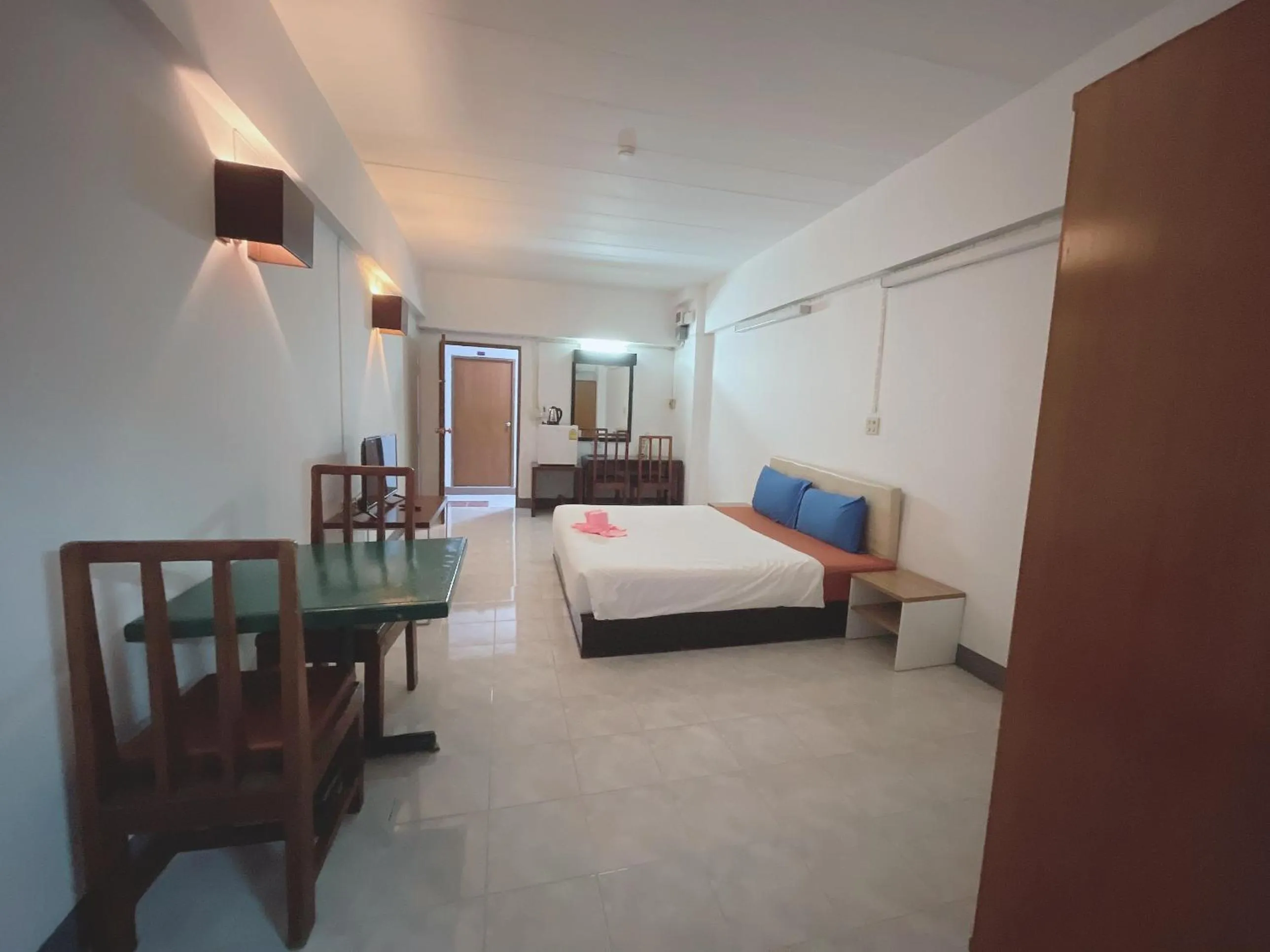 Bed in โรงแรมวินบางนา Win Bangna Hotel