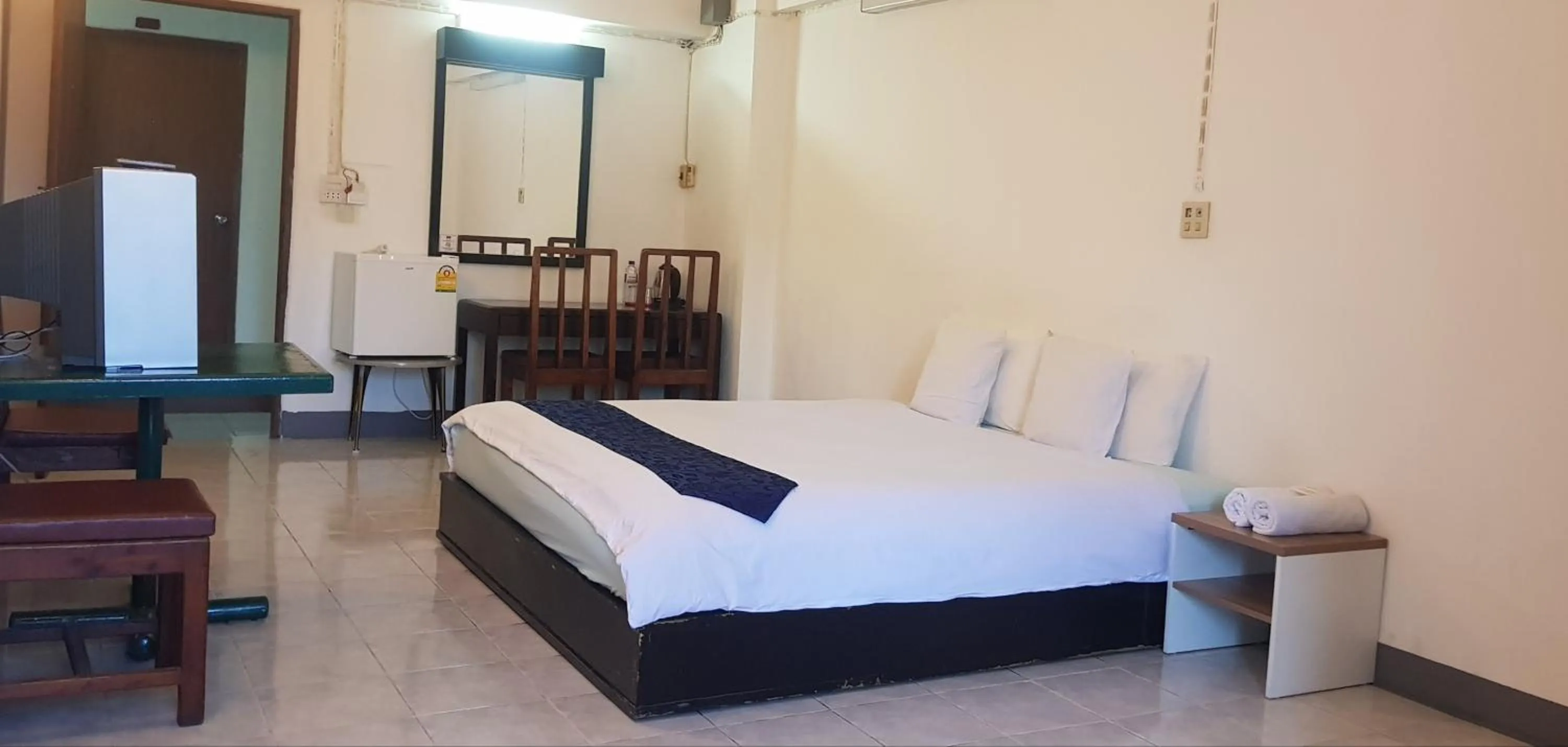 Bed in โรงแรมวินบางนา Win Bangna Hotel