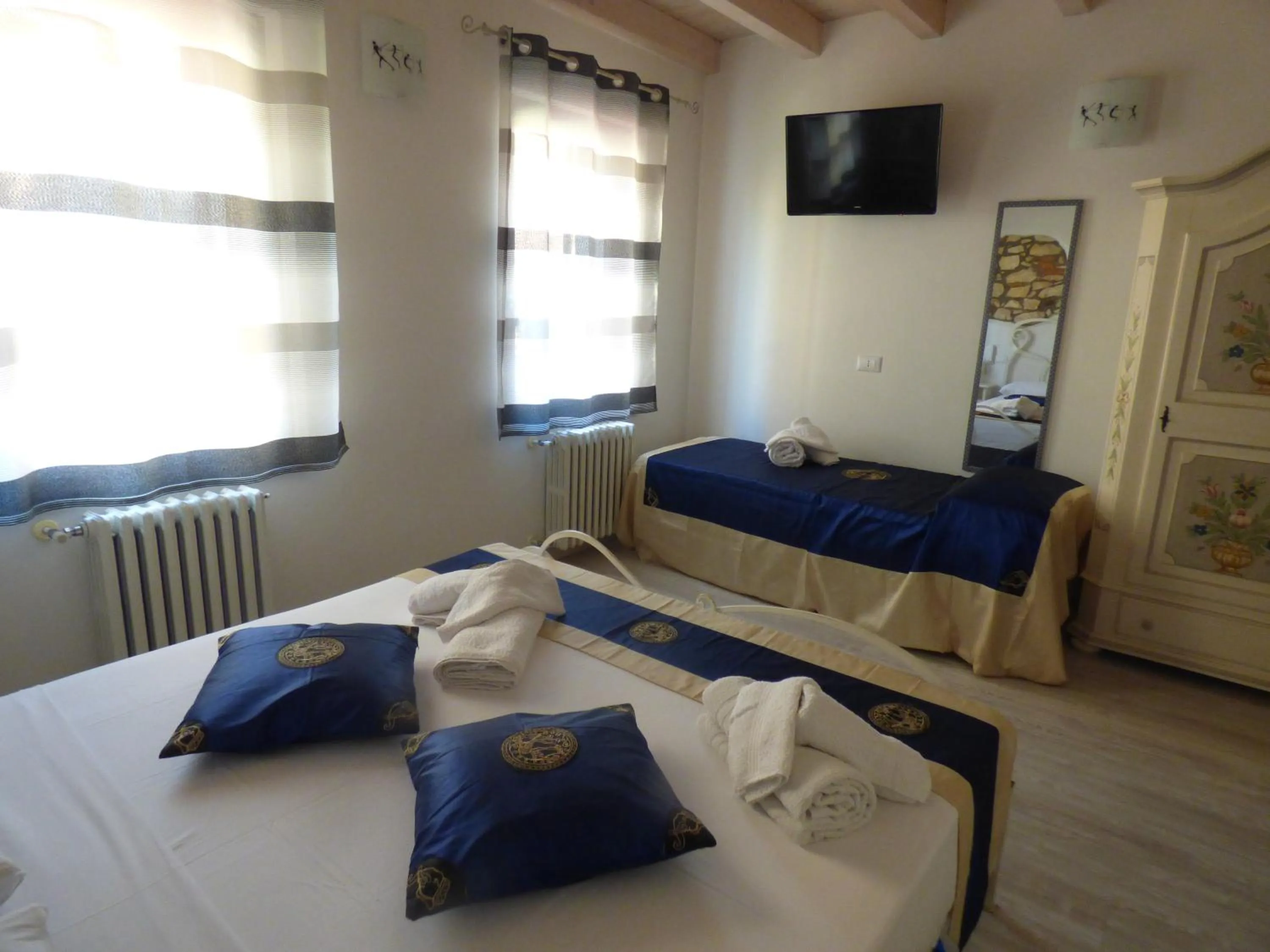 Bed in NICOLE DONEY LOCAZIONE TURISTICA