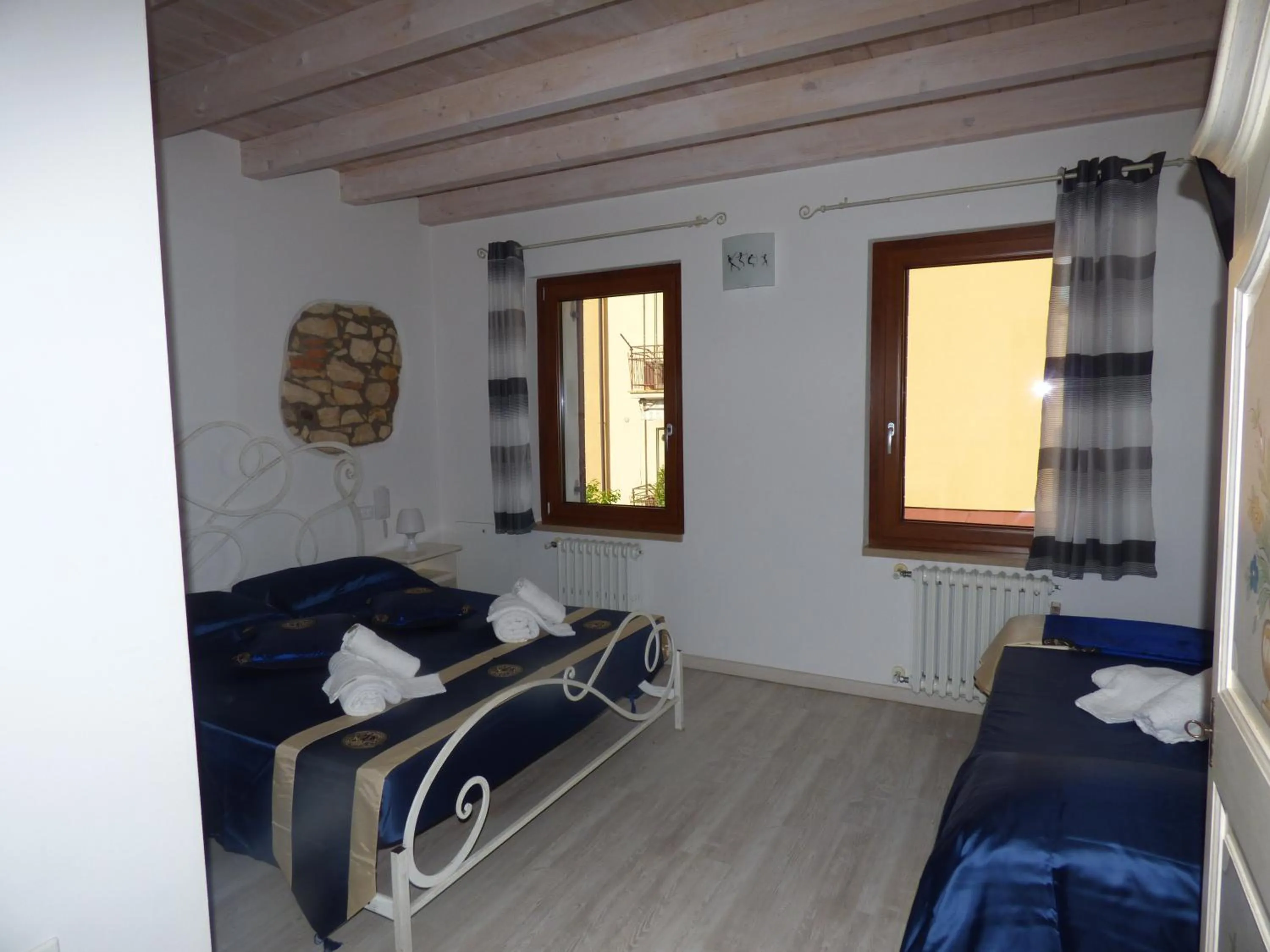 Bed in NICOLE DONEY LOCAZIONE TURISTICA