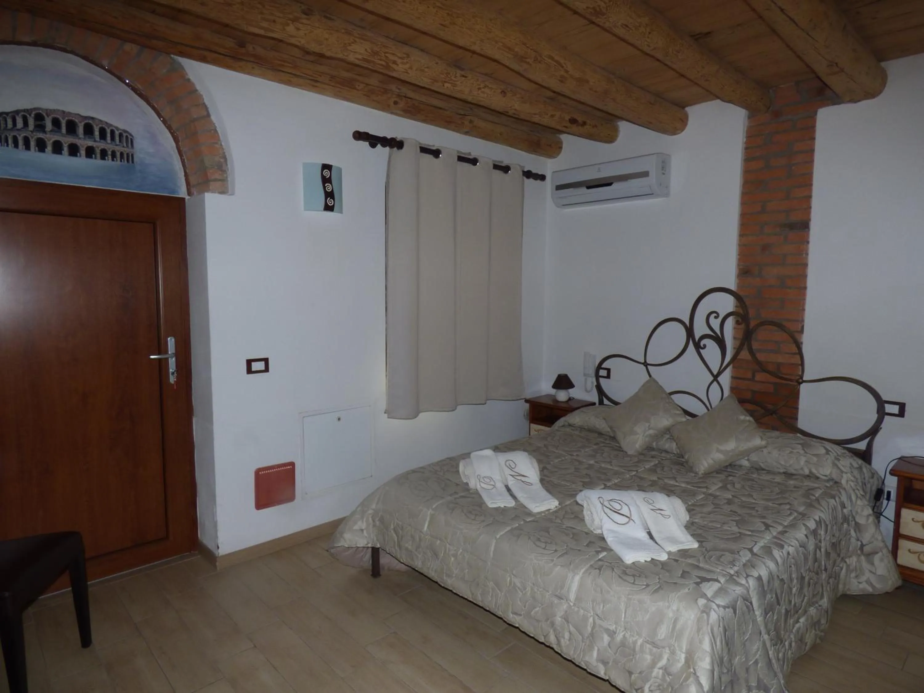 Bed in NICOLE DONEY LOCAZIONE TURISTICA