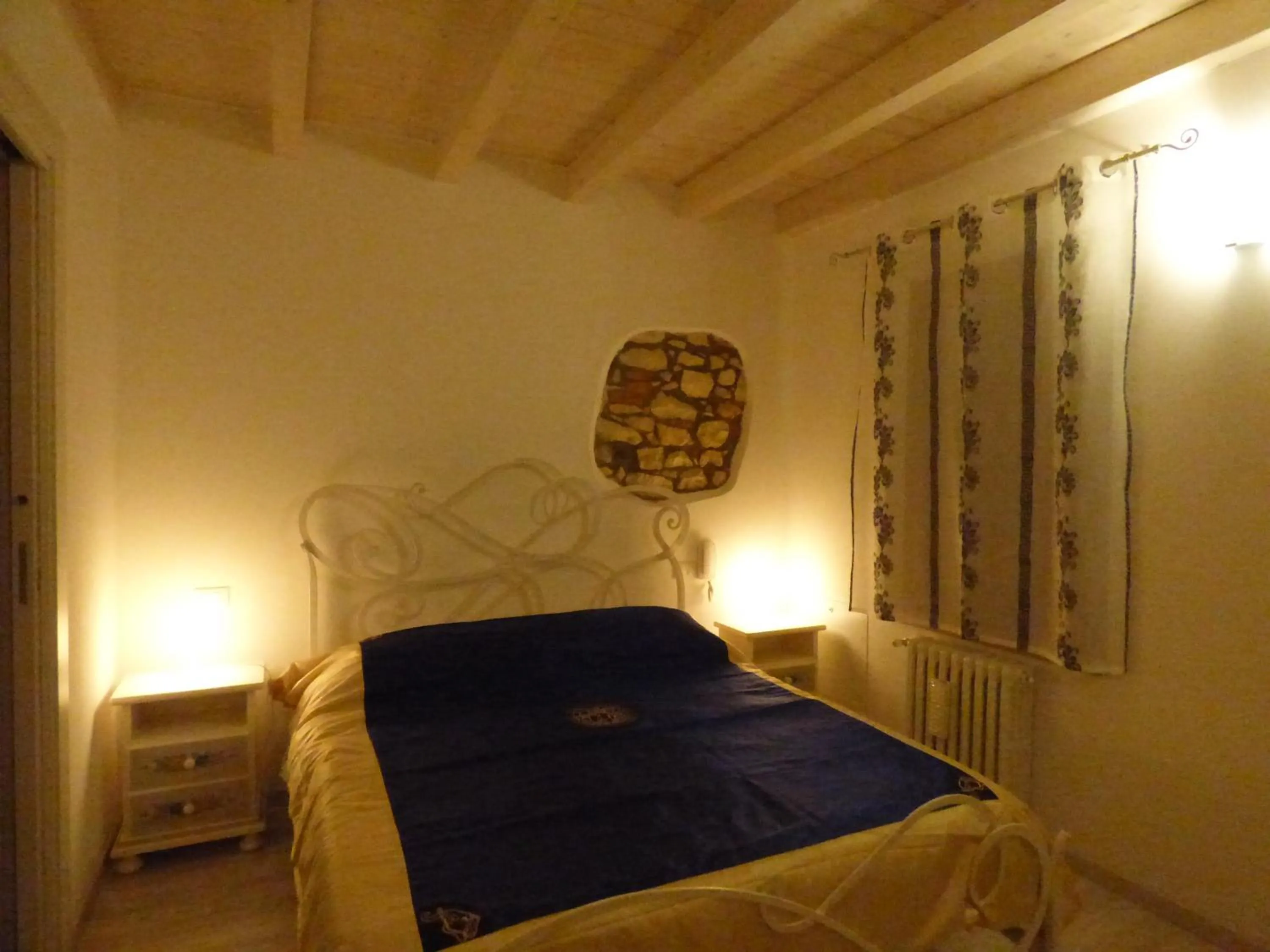 Bed in NICOLE DONEY LOCAZIONE TURISTICA