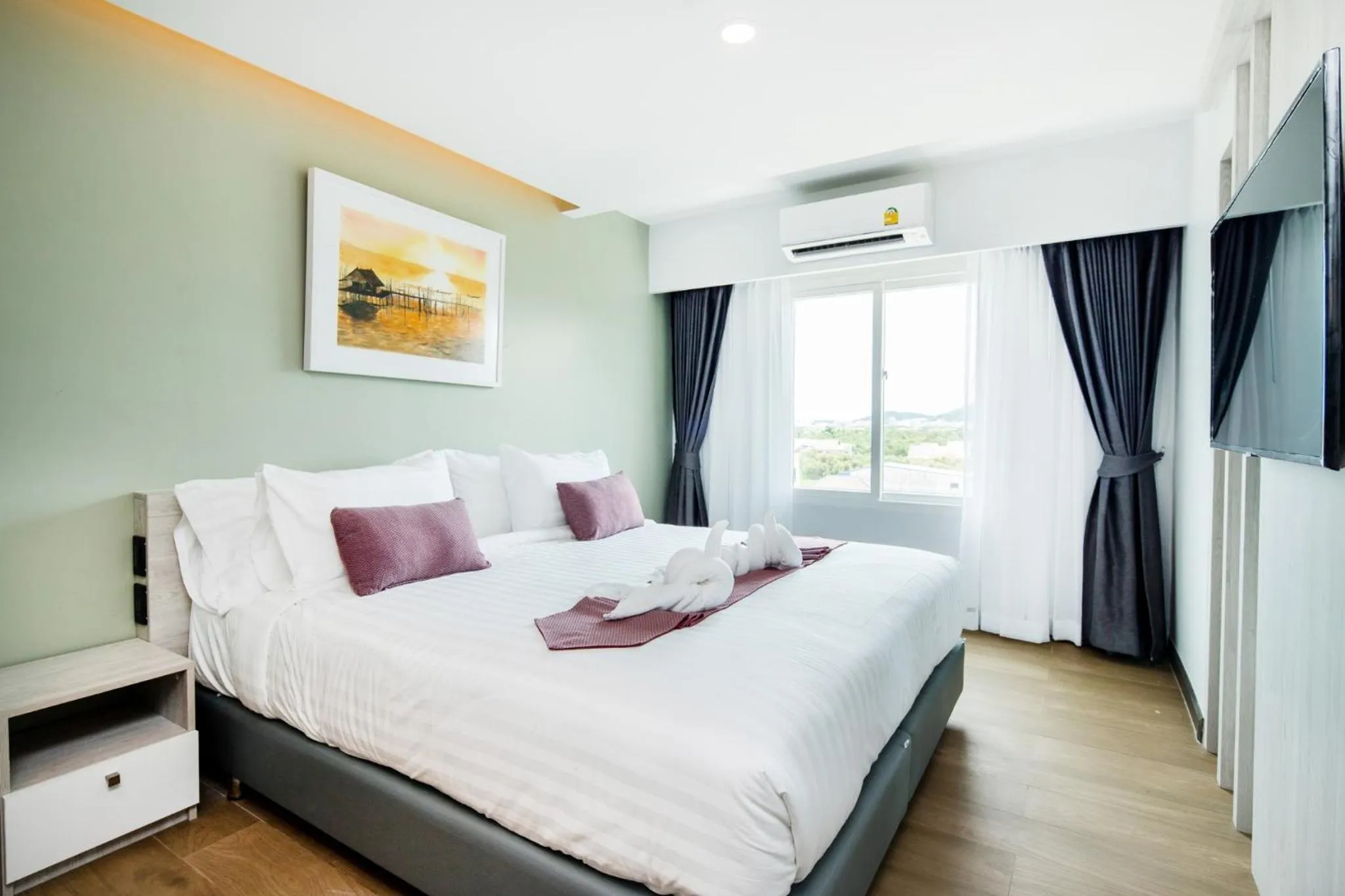 Bed in Benjaphorn Grandview Hotel