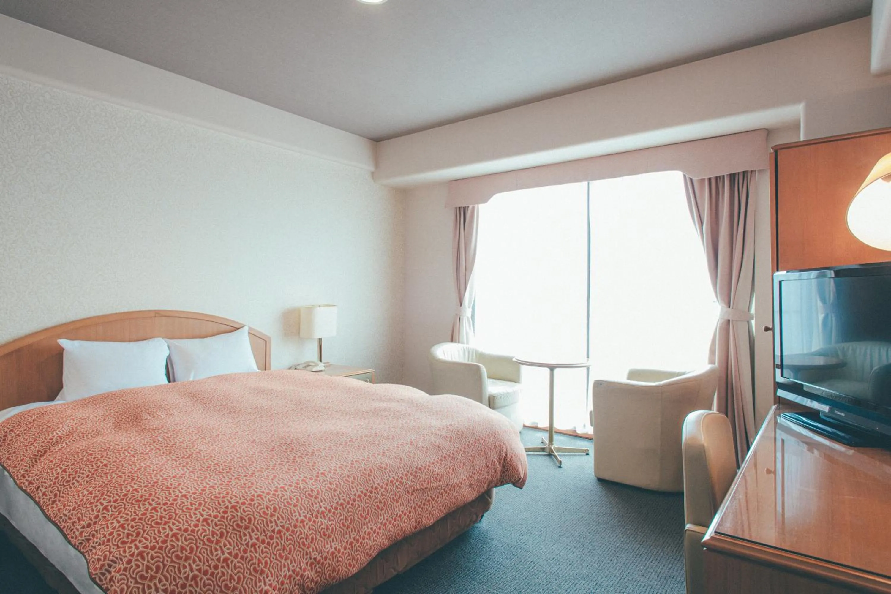 Bed in Hotel Villa Kuretake