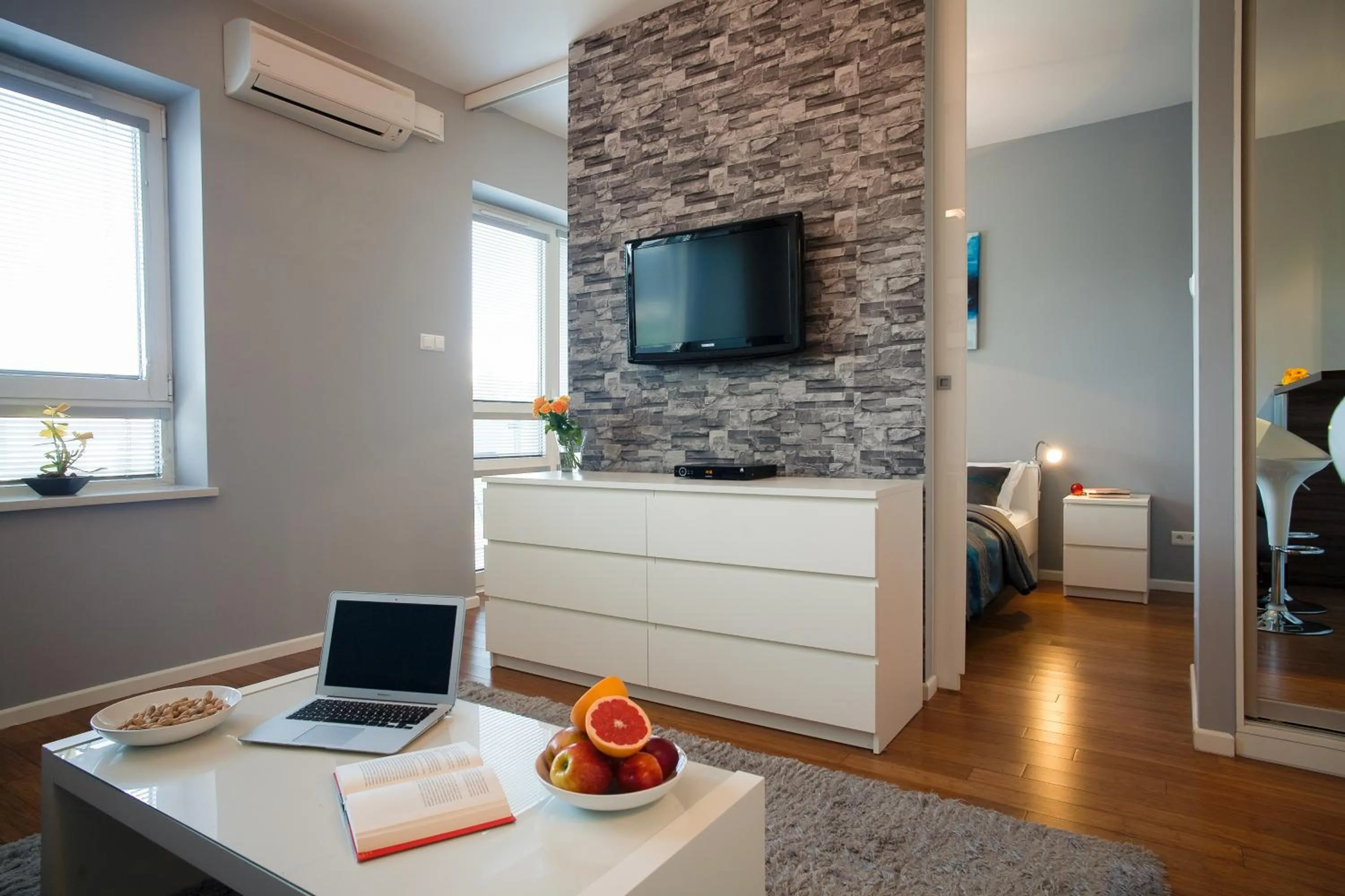 Seating area, Bed in Platinum Towers Central Apartments