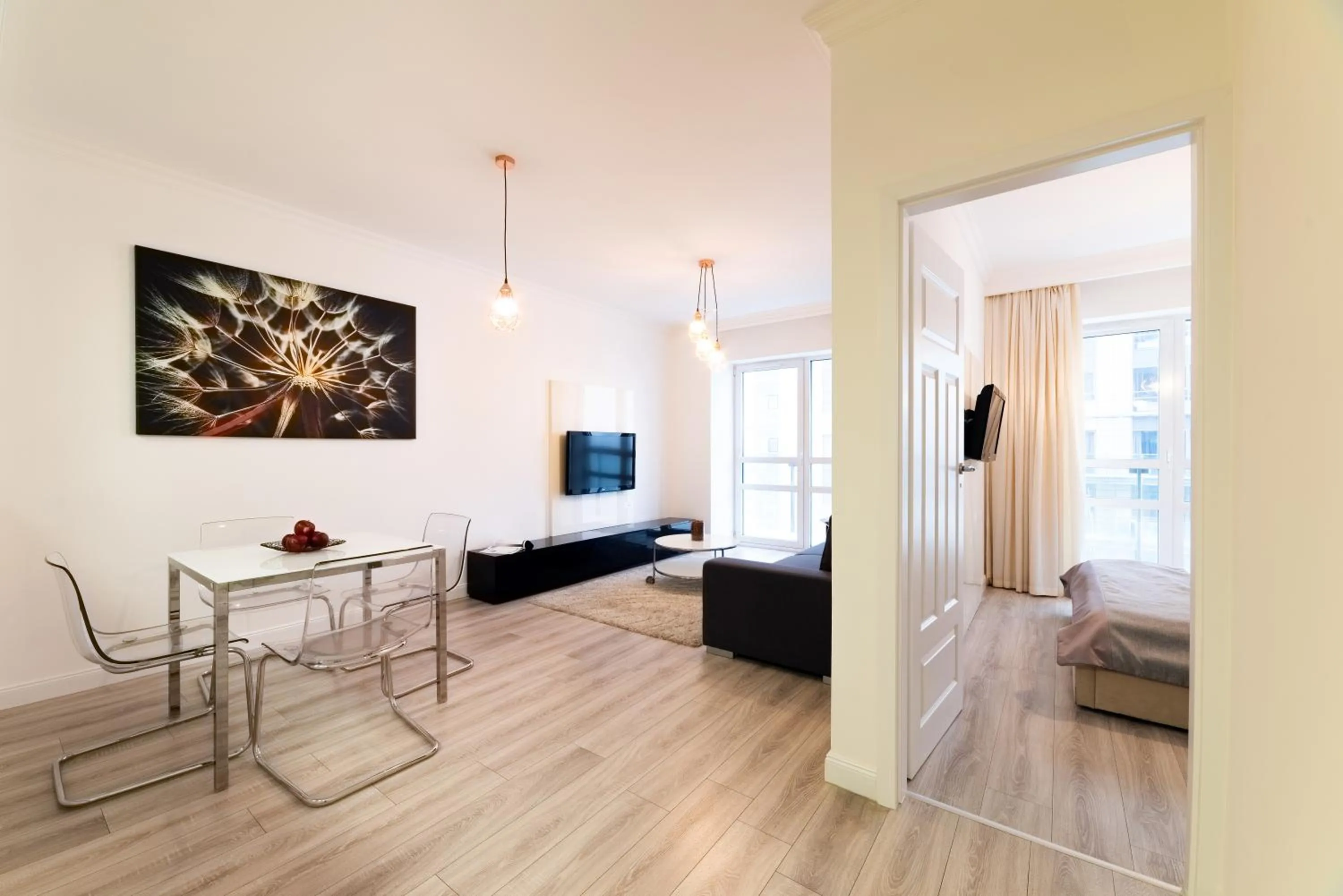 Living room, Bed in Platinum Towers Central Apartments