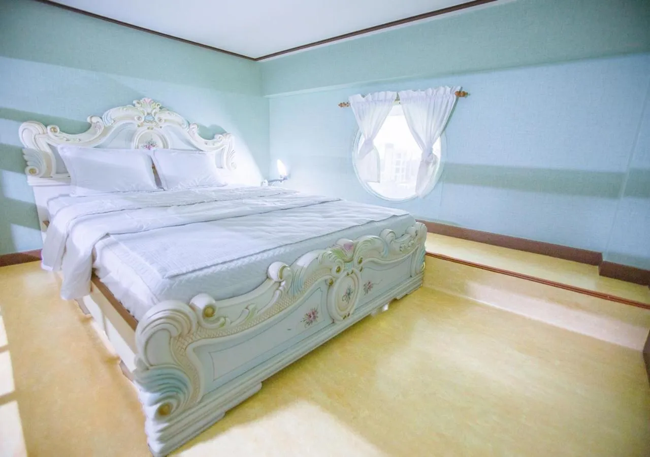 Bed in Jeju Resortel