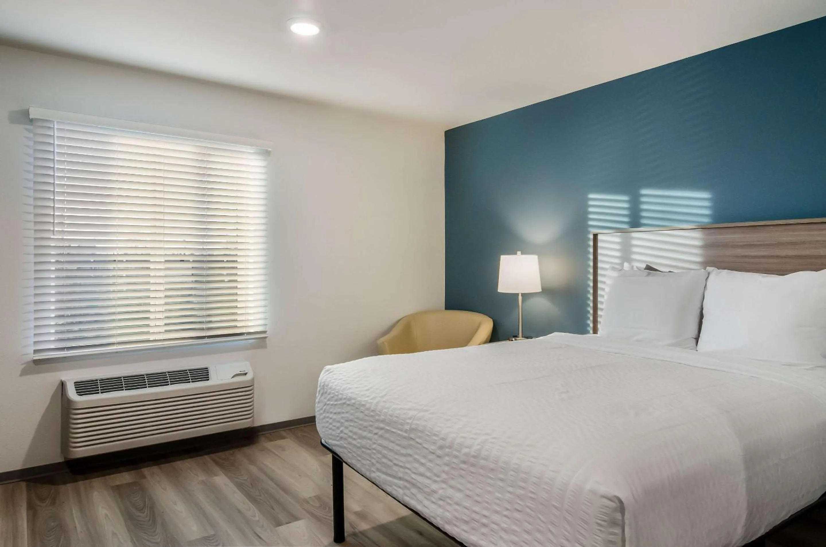 Photo of the whole room, Bed in WoodSpring Suites Tacoma - Lakewood