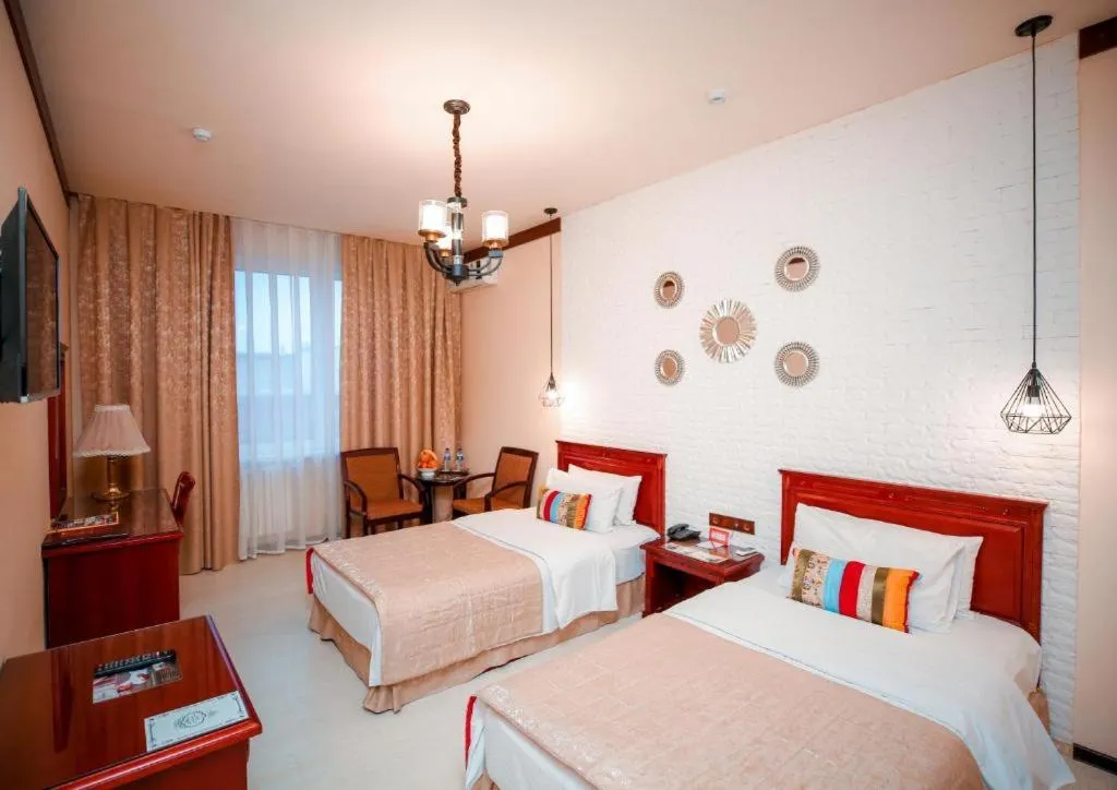 Bed in Asia Tashkent Hotel