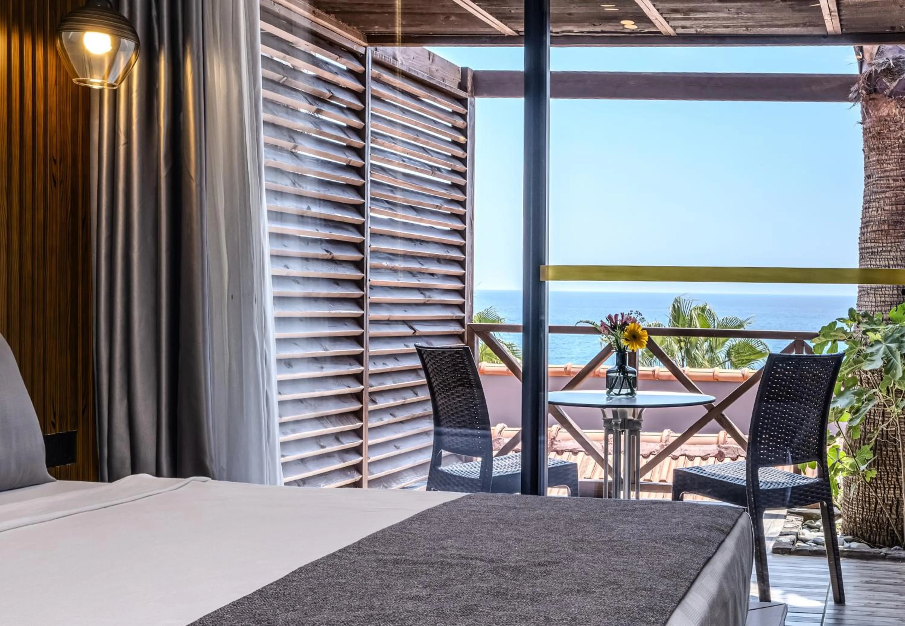 Patio, Bed in Adora Calma Beach Hotel Adults Only