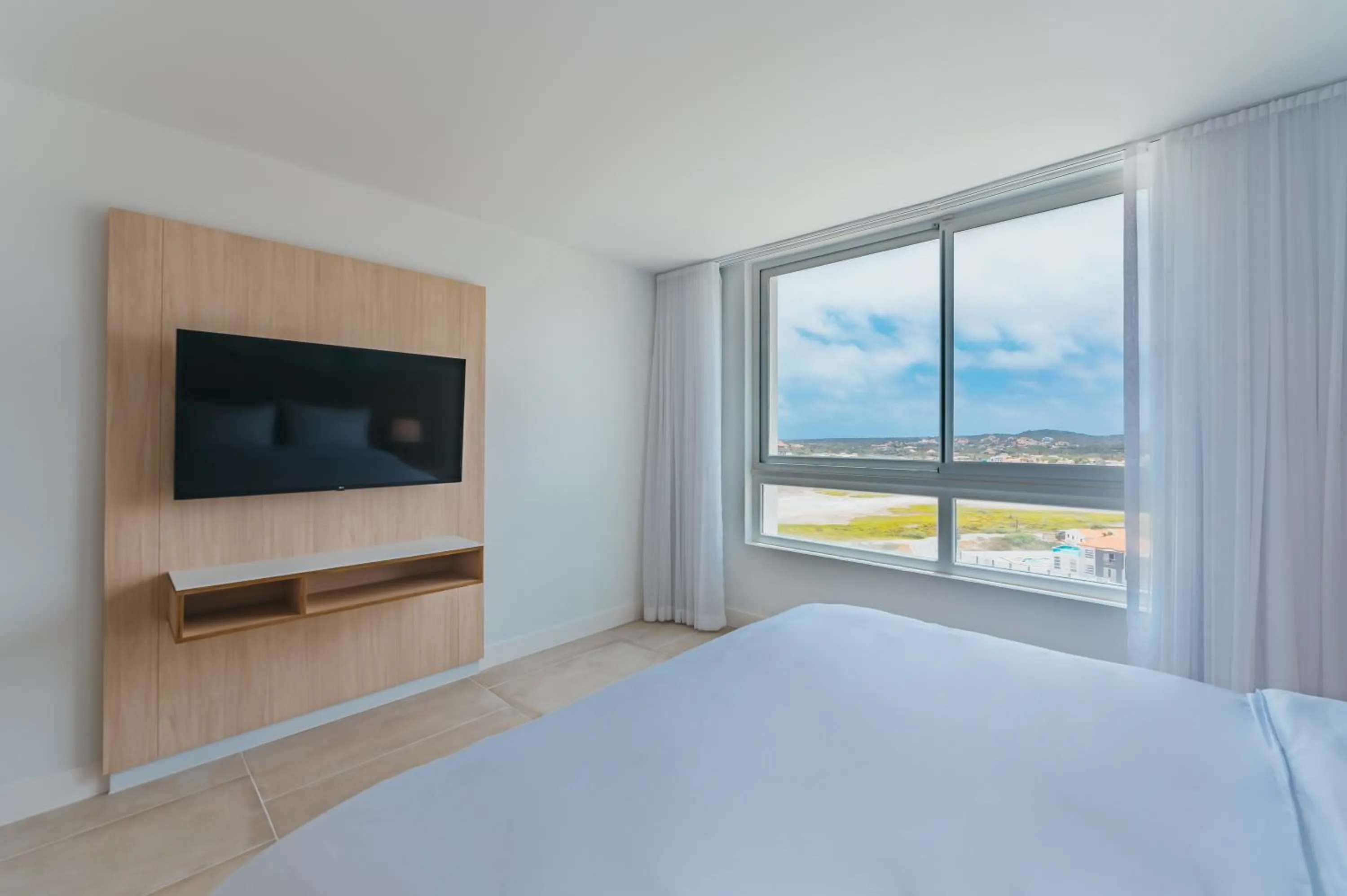 TV and multimedia, Bed in Radisson Blu Aruba