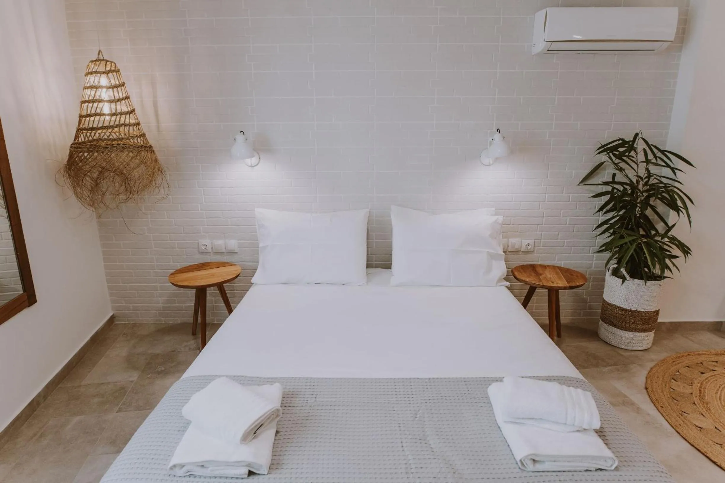 Bed in ERIEL Boutique Apartments