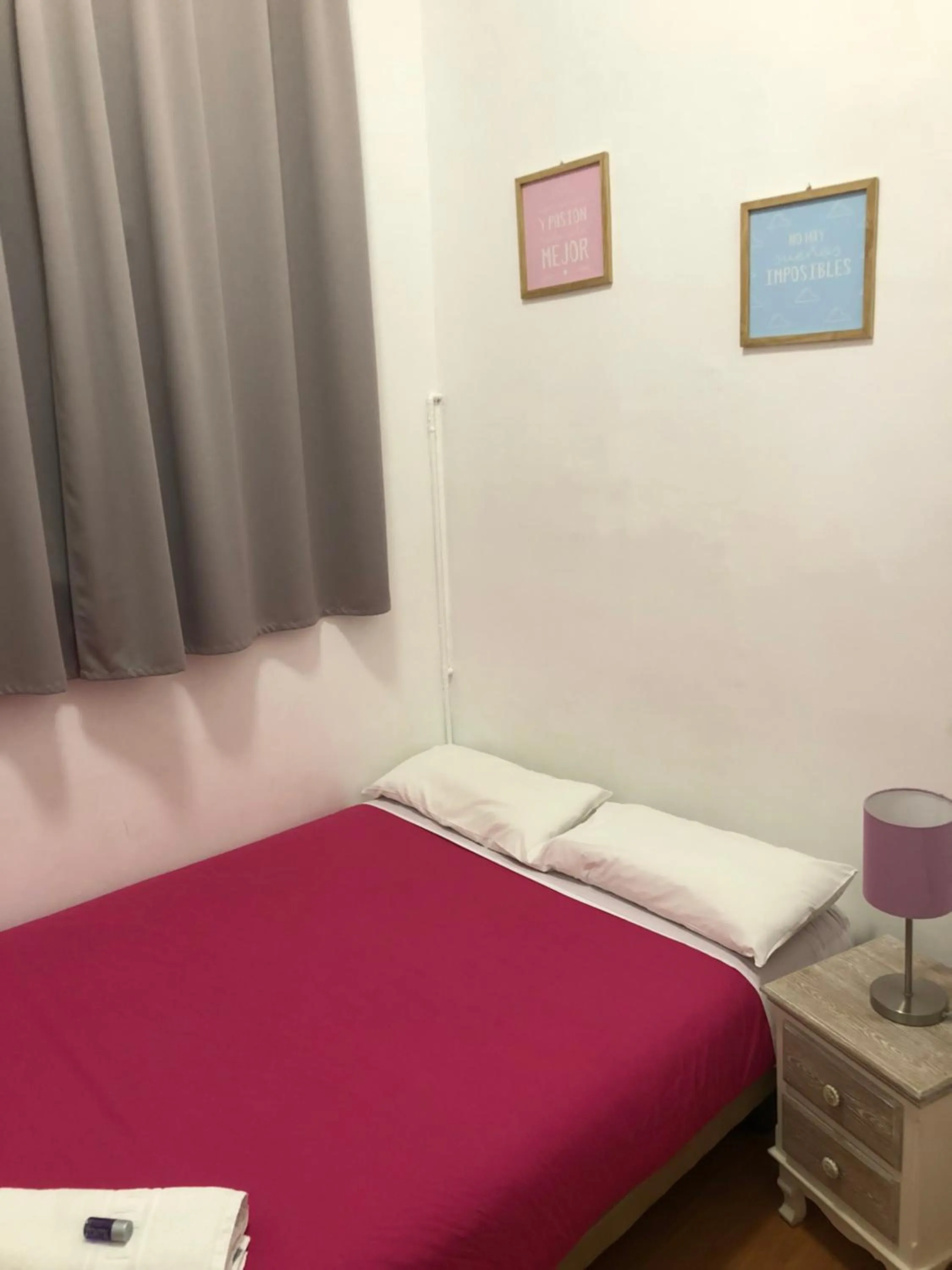 Photo of the whole room, Bed in Hostal MiMi Las Ramblas