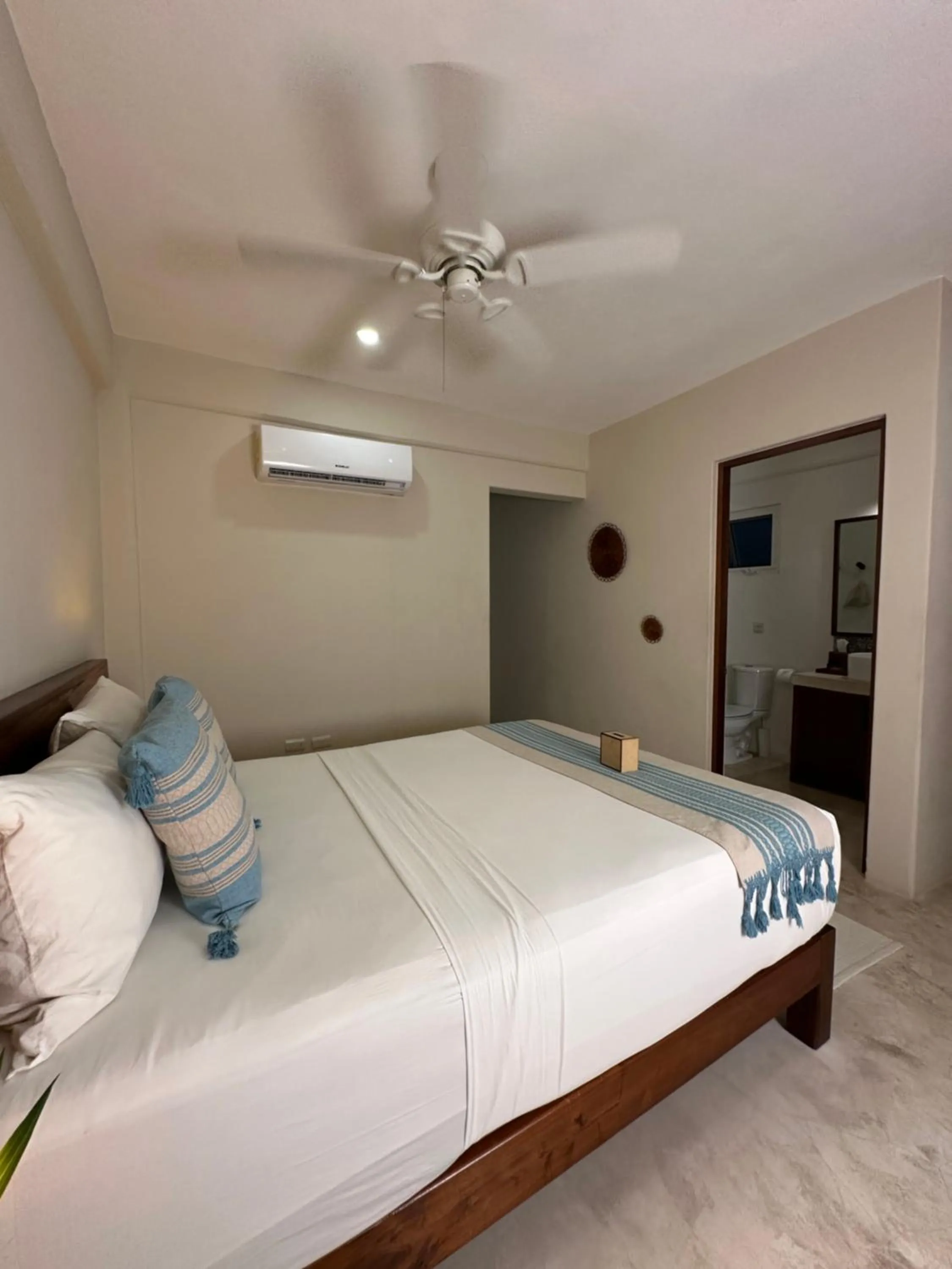 Bed in Noah Beach Hotel & Suites