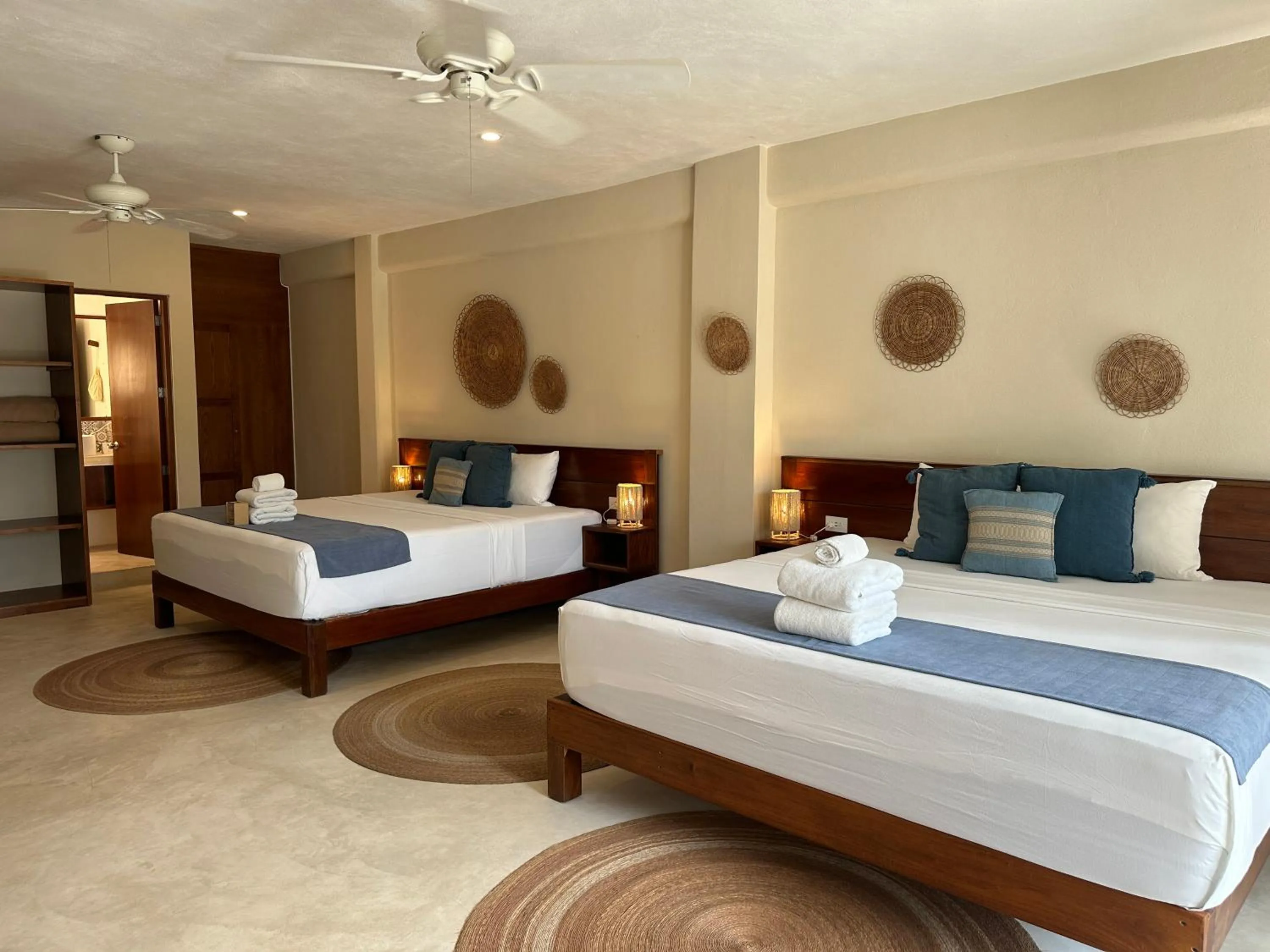 Bed in Noah Beach Hotel & Suites