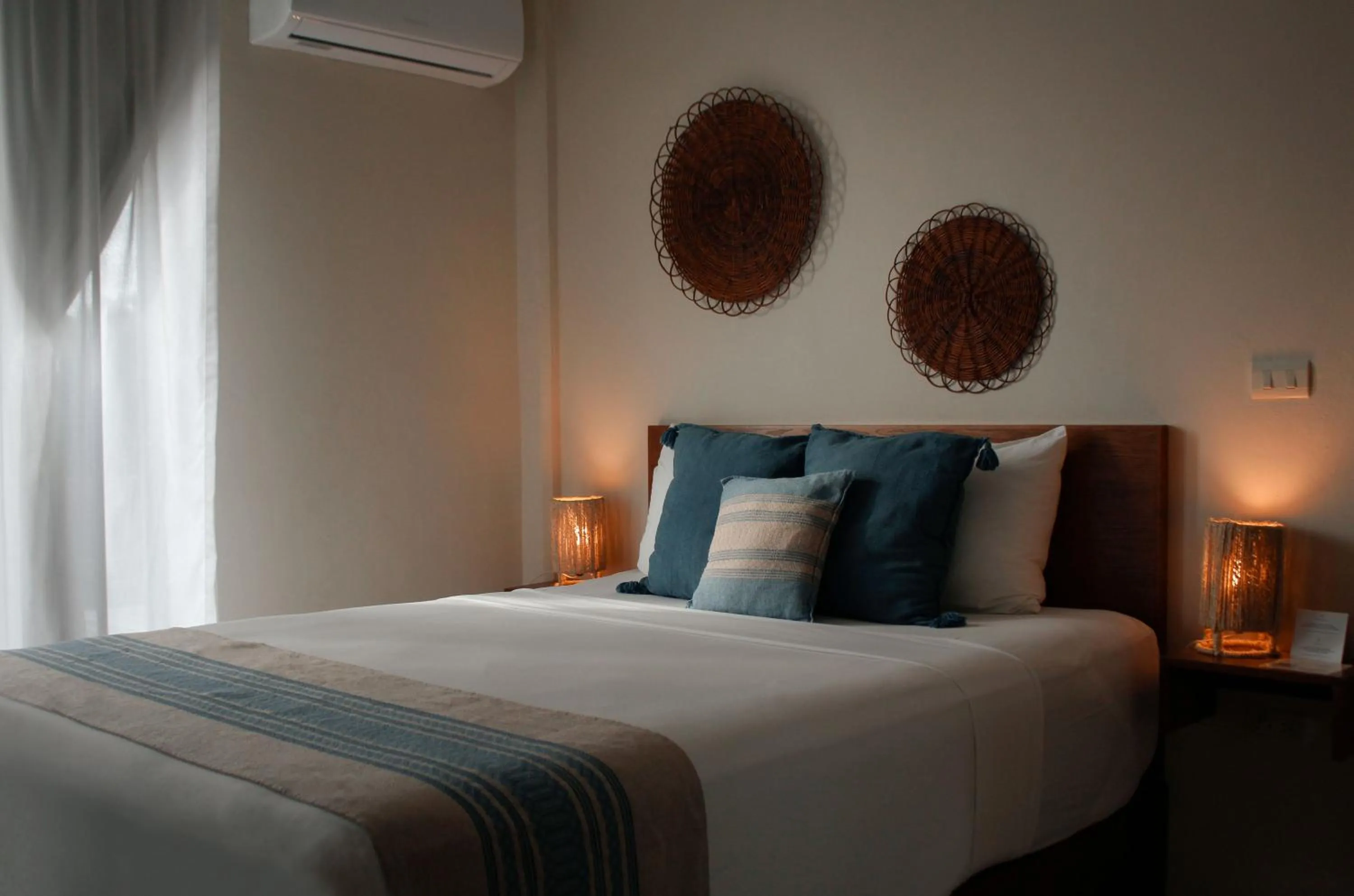 Bed in Noah Beach Hotel & Suites