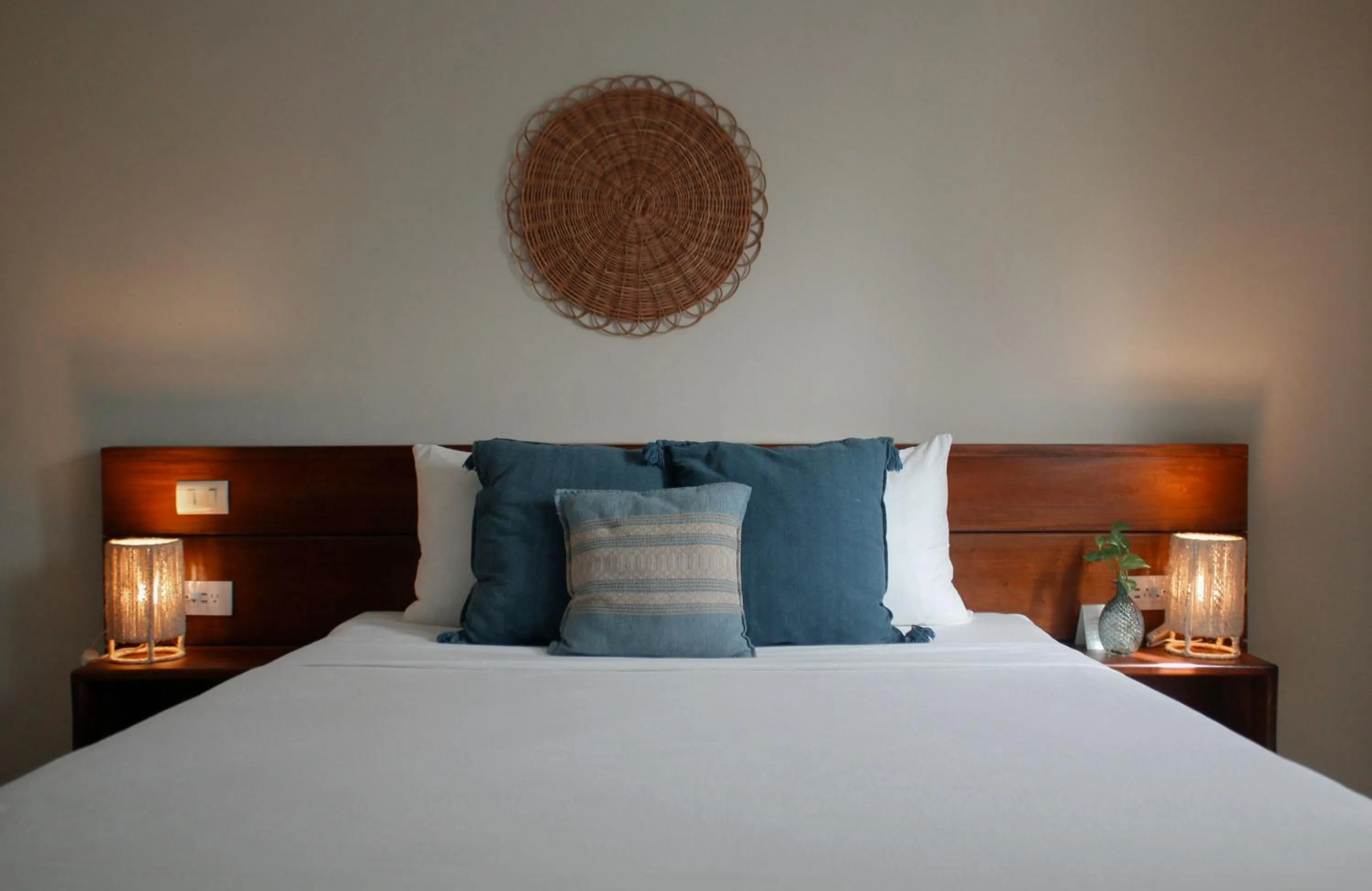 Bed in Noah Beach Hotel & Suites