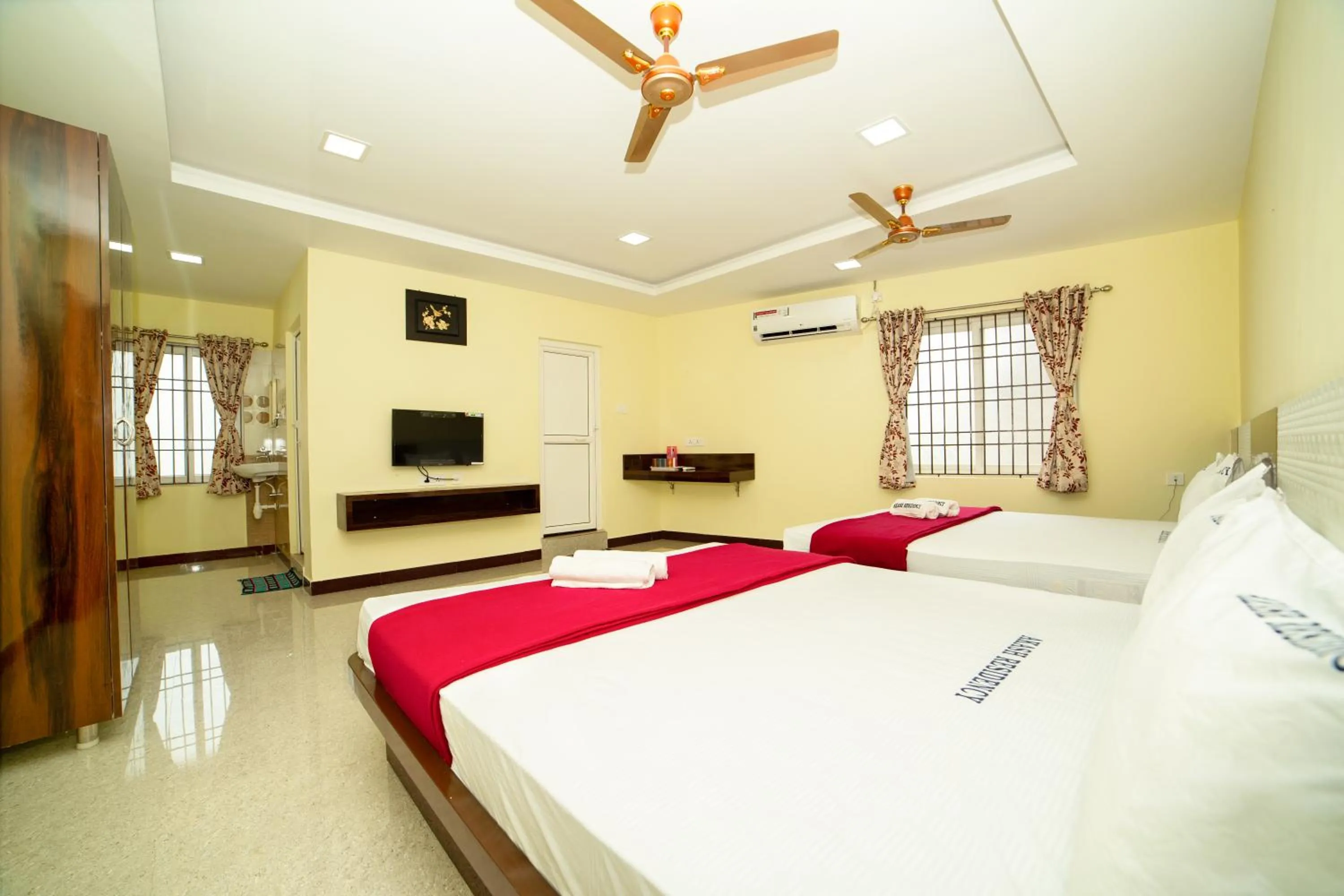 Living room, Bed in Akash Residency