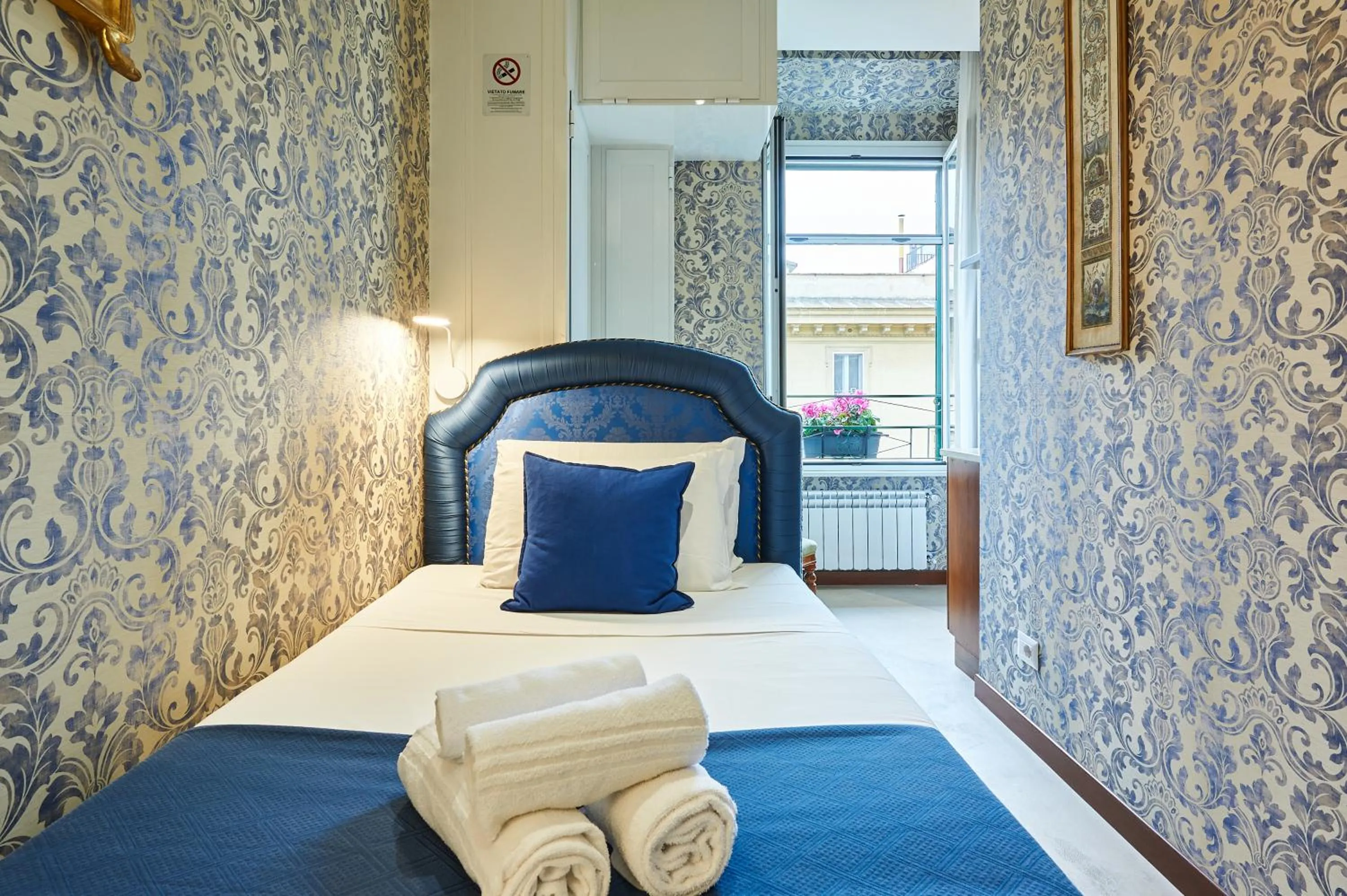 Bed in Fabrizio's Rooms