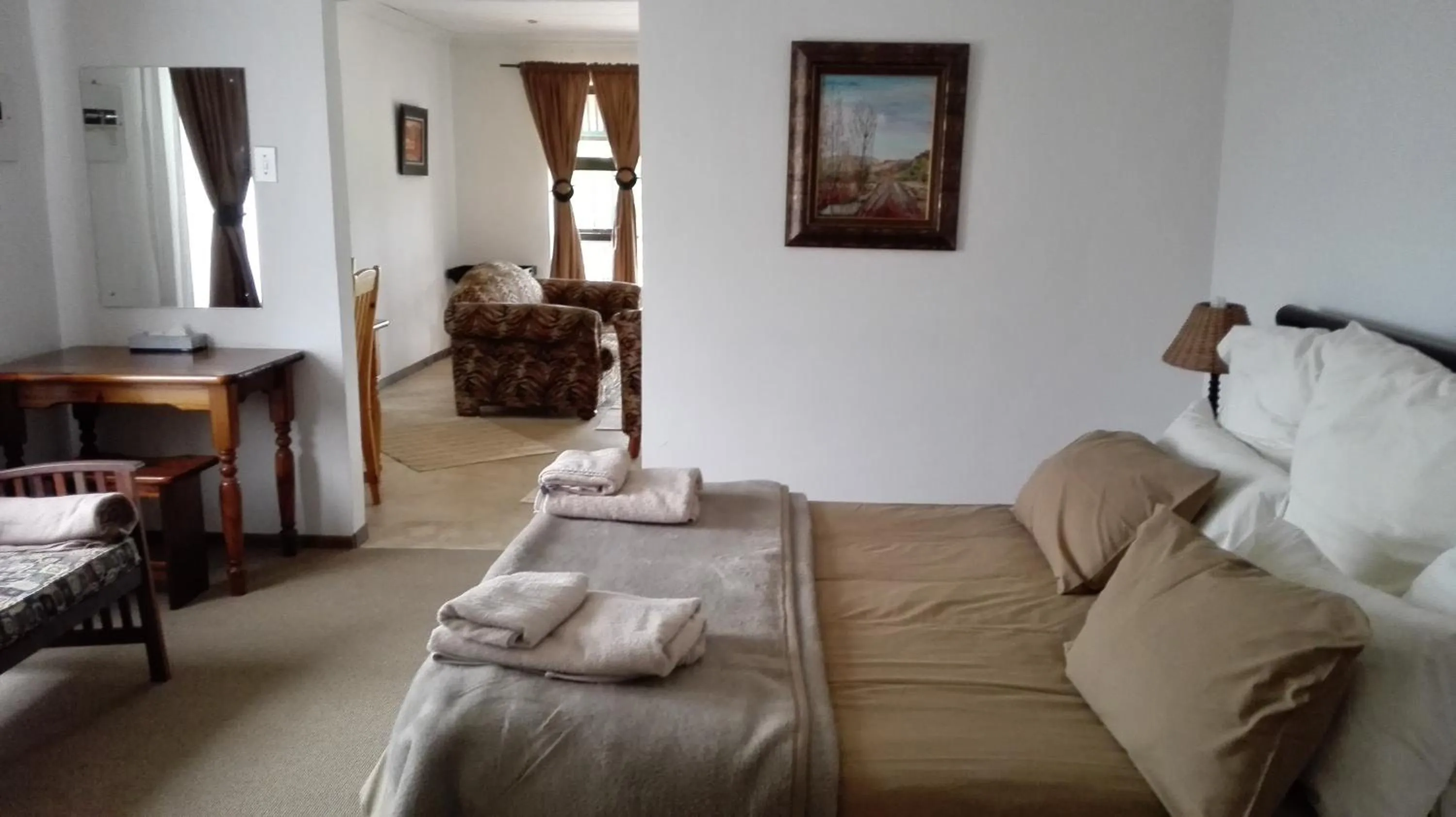 Living room, Bed in Pumula Guest Farm