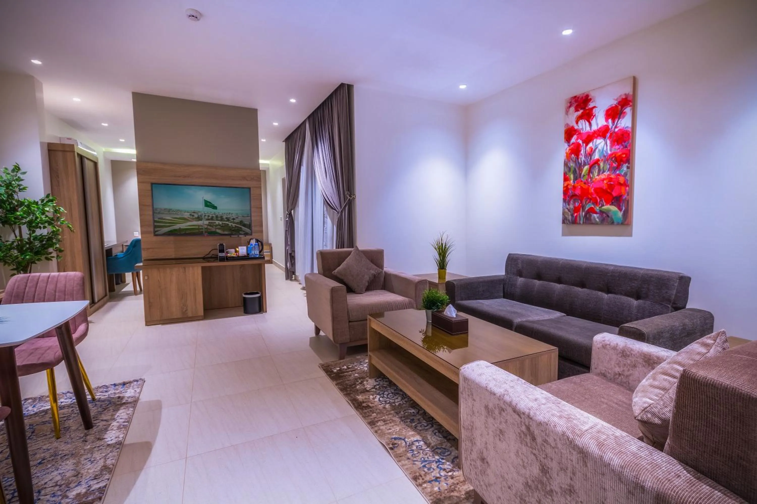 Communal lounge/ TV room in The Address Palace Apartments