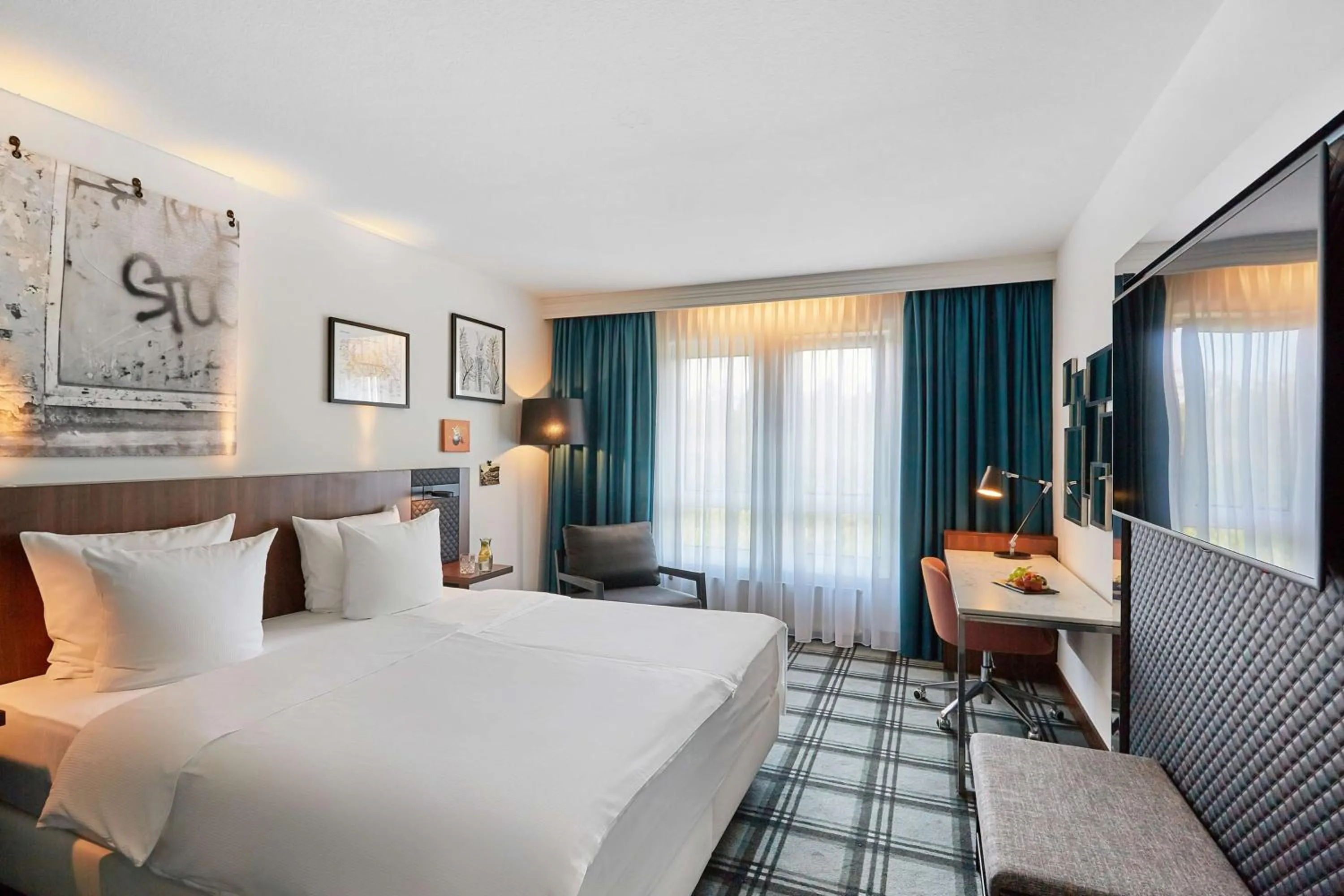 Photo of the whole room, Bed in Radisson Blu Hotel Karlsruhe