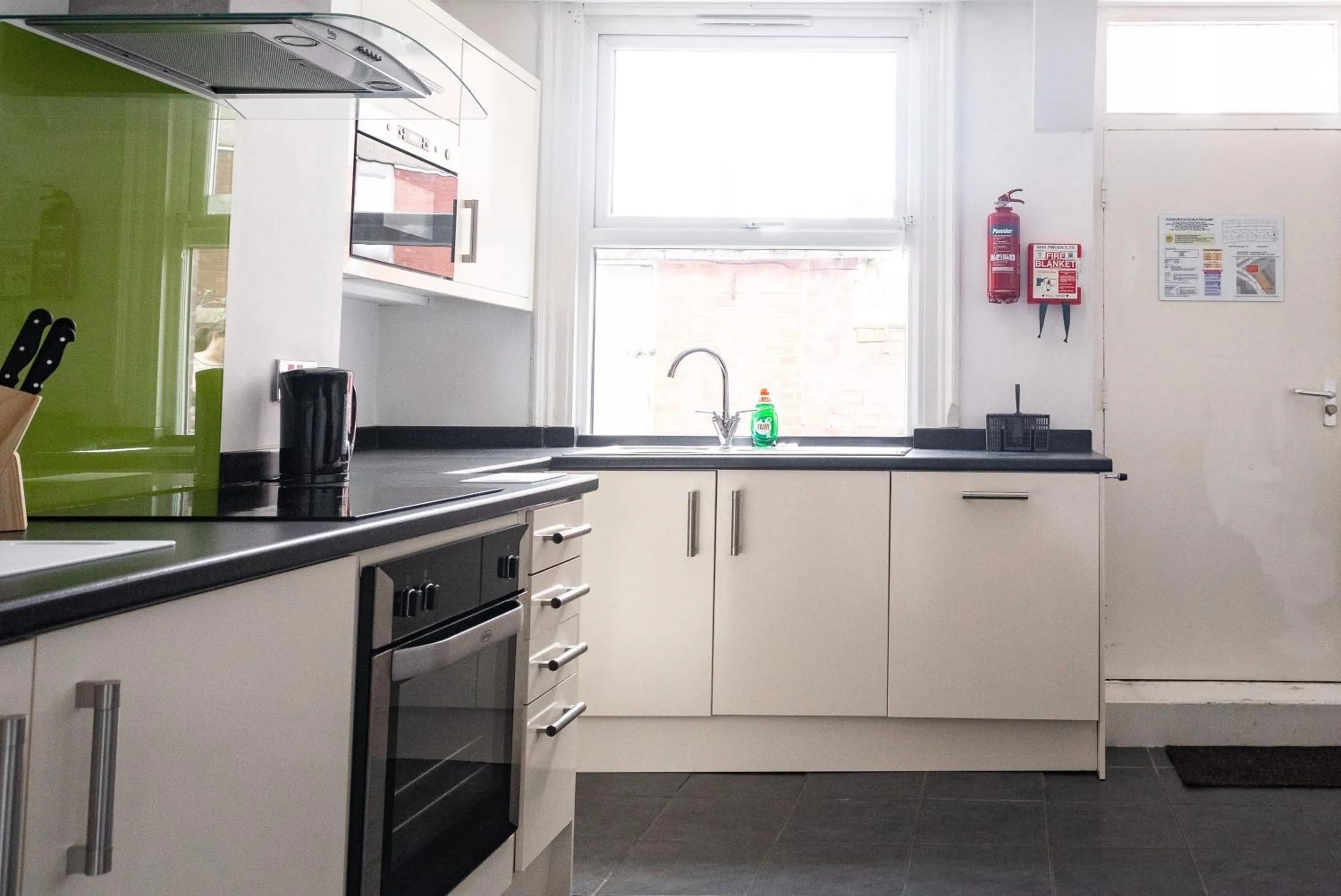 Kitchen or kitchenette in H.V Apartments