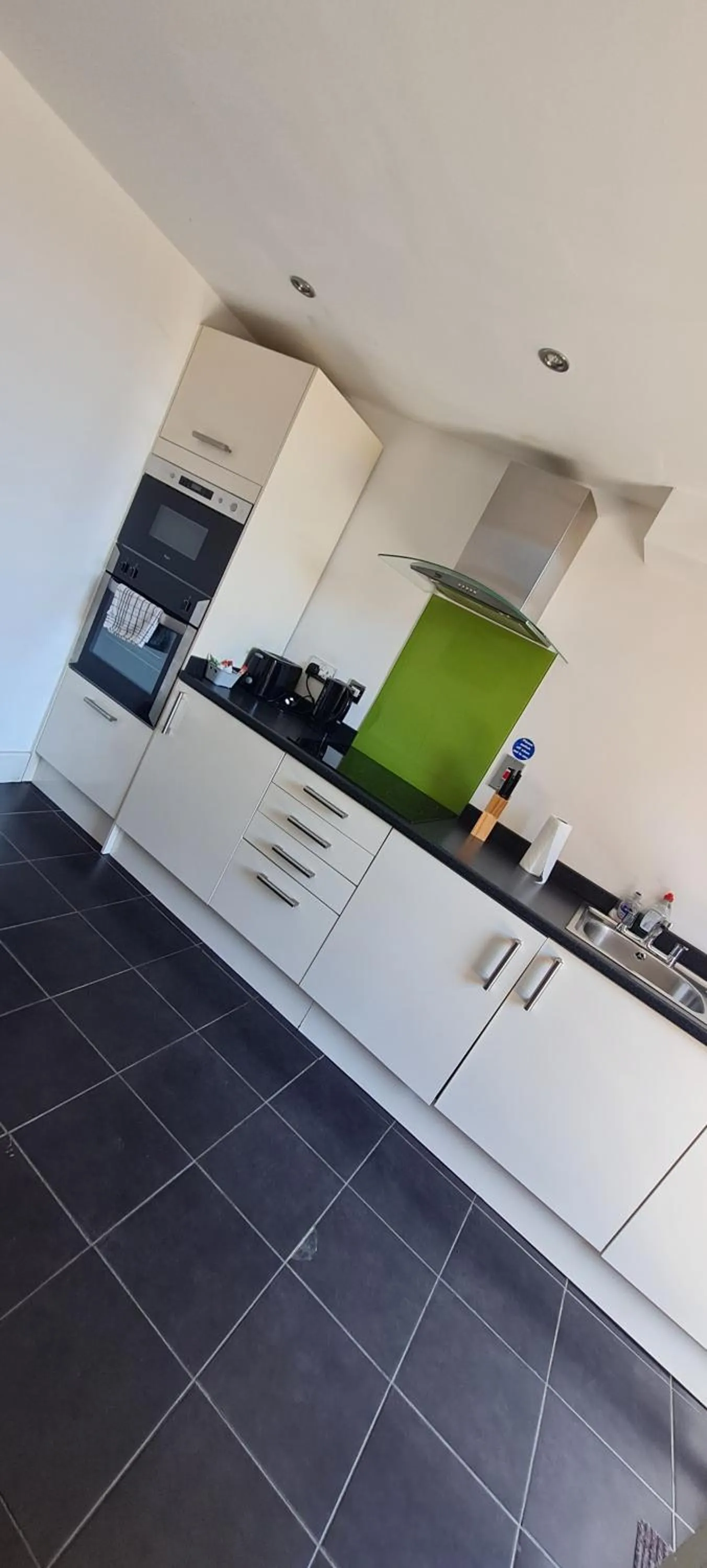 Kitchen or kitchenette in H.V Apartments