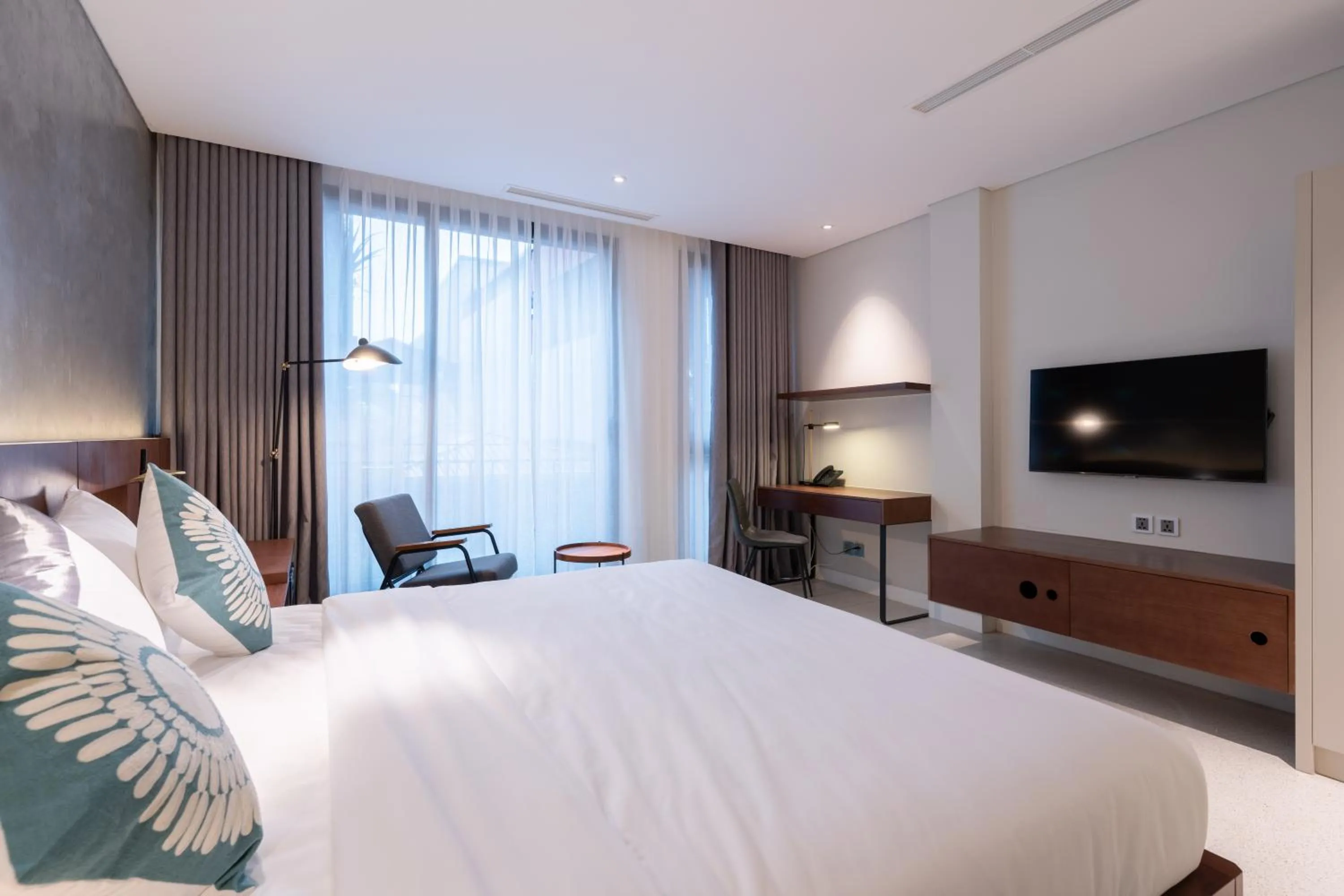 Bed in Bi Eco Suites Hanoi