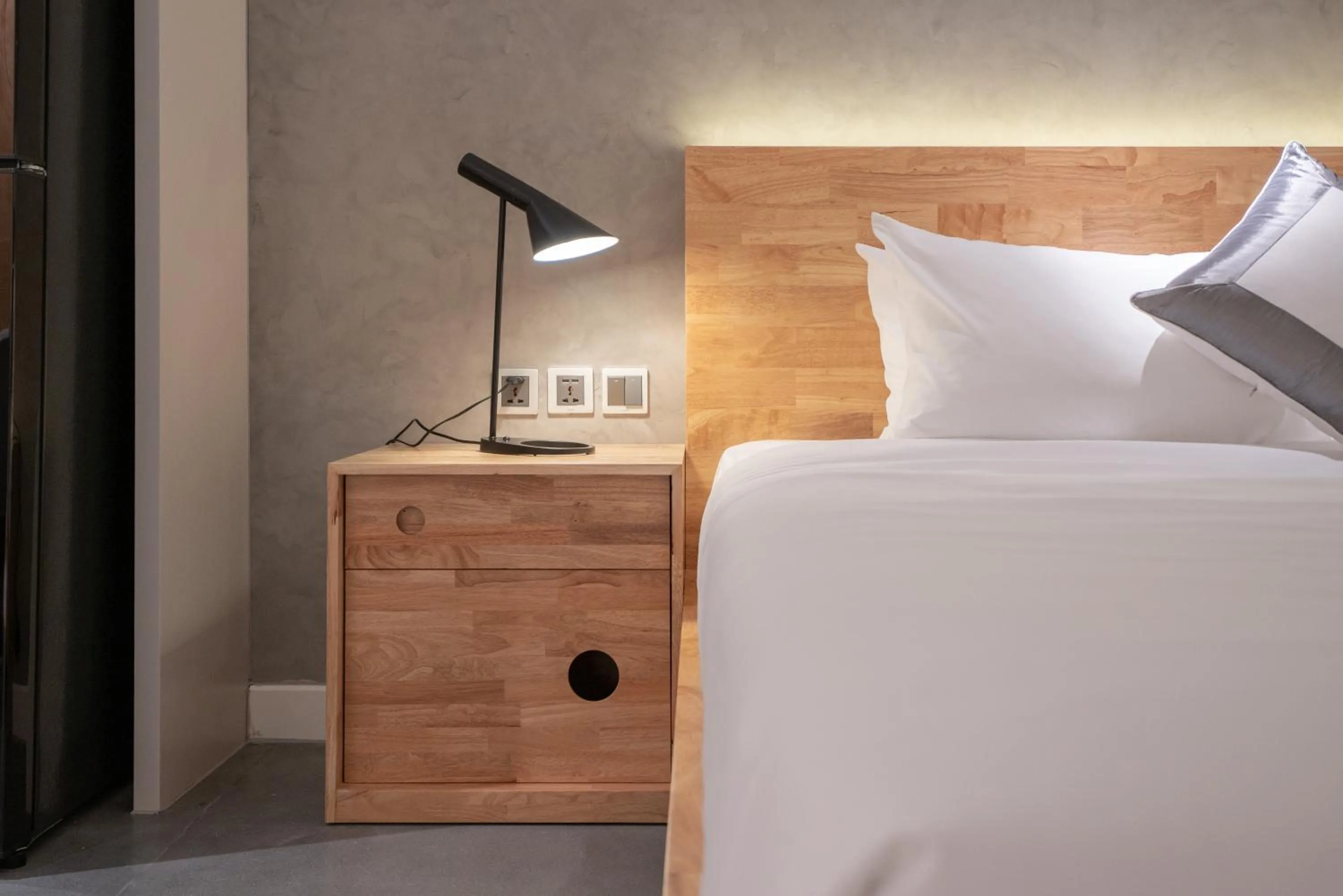 Bed in Bi Eco Suites Hanoi