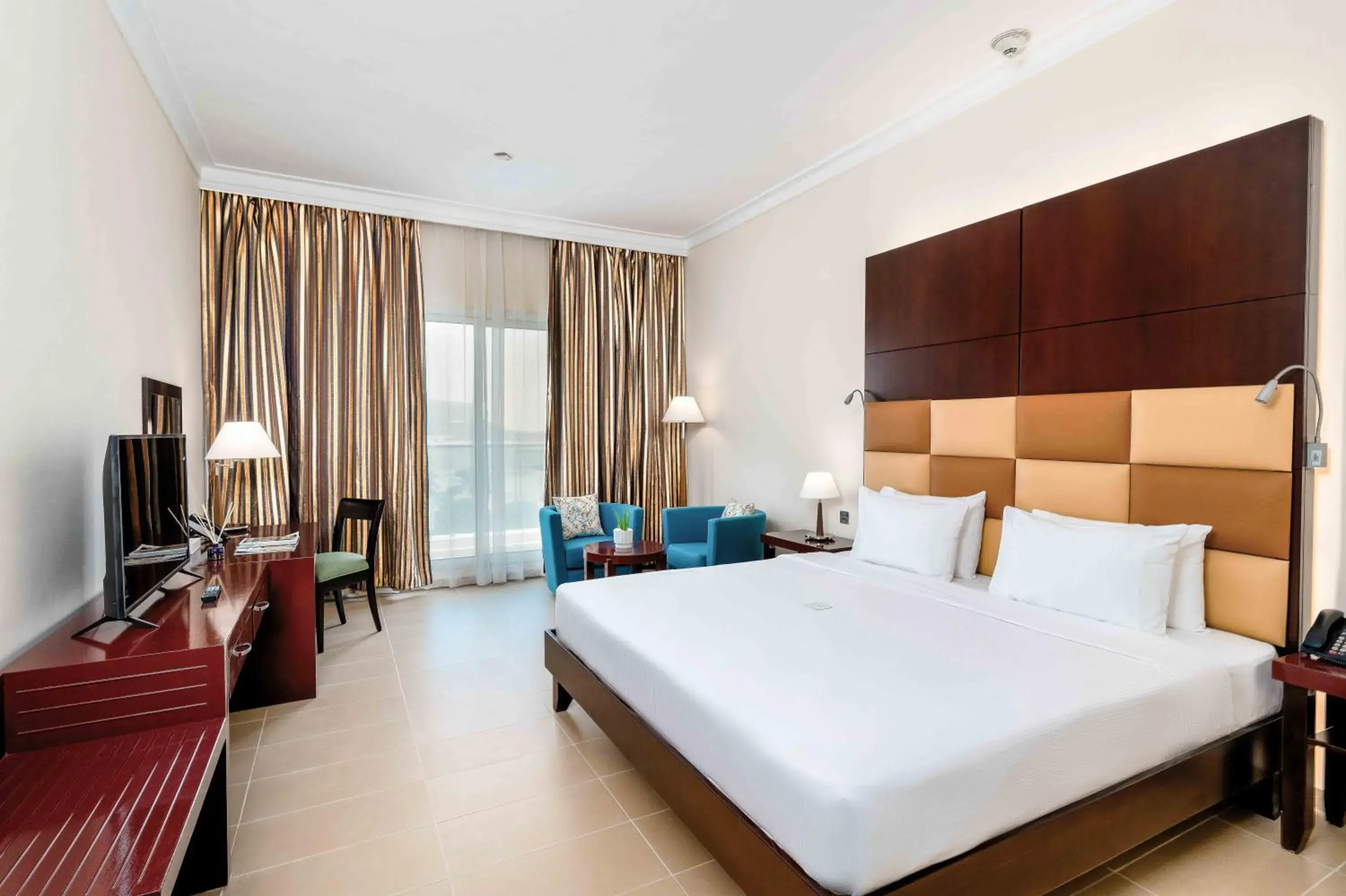 Deluxe Room City View with One King Bed - single occupancy in Metropolitan Al Mafraq Hotel Deluxe Room City View with One King Bed - single occupancy in Metropolitan Al Mafraq Hotel