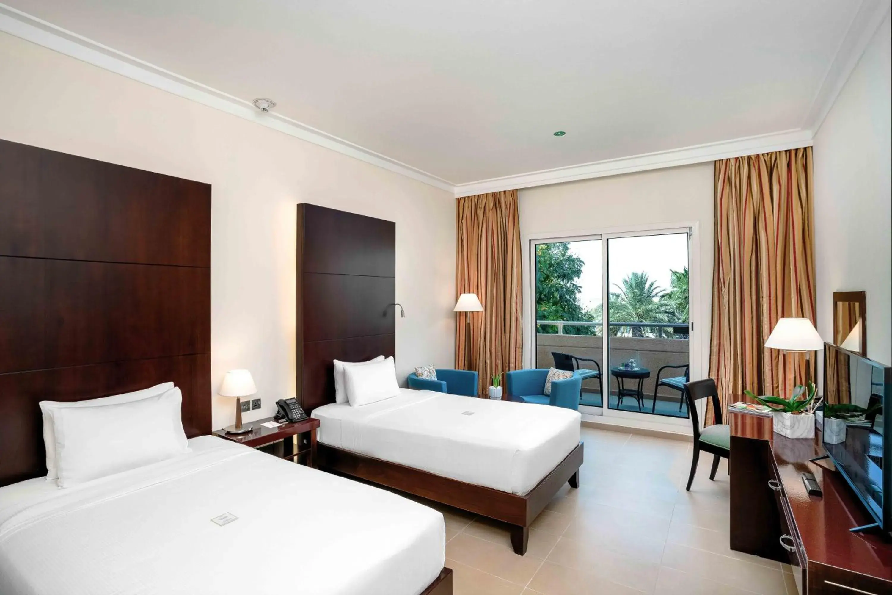 Deluxe Twin Pool View - single occupancy in Metropolitan Al Mafraq Hotel Deluxe Twin Pool View - single occupancy in Metropolitan Al Mafraq Hotel