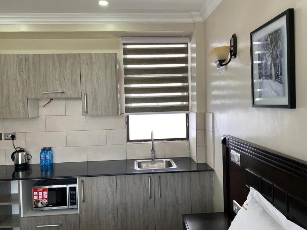 Kitchen or kitchenette, Kitchen/Kitchenette in Hemak Suites