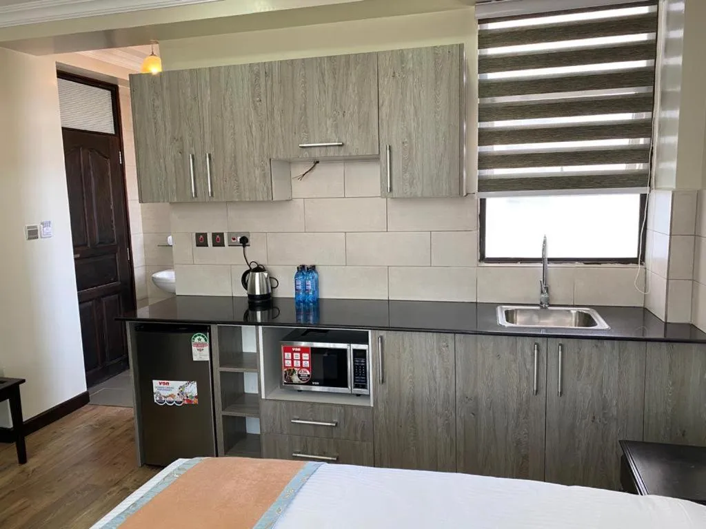 Kitchen or kitchenette, Kitchen/Kitchenette in Hemak Suites