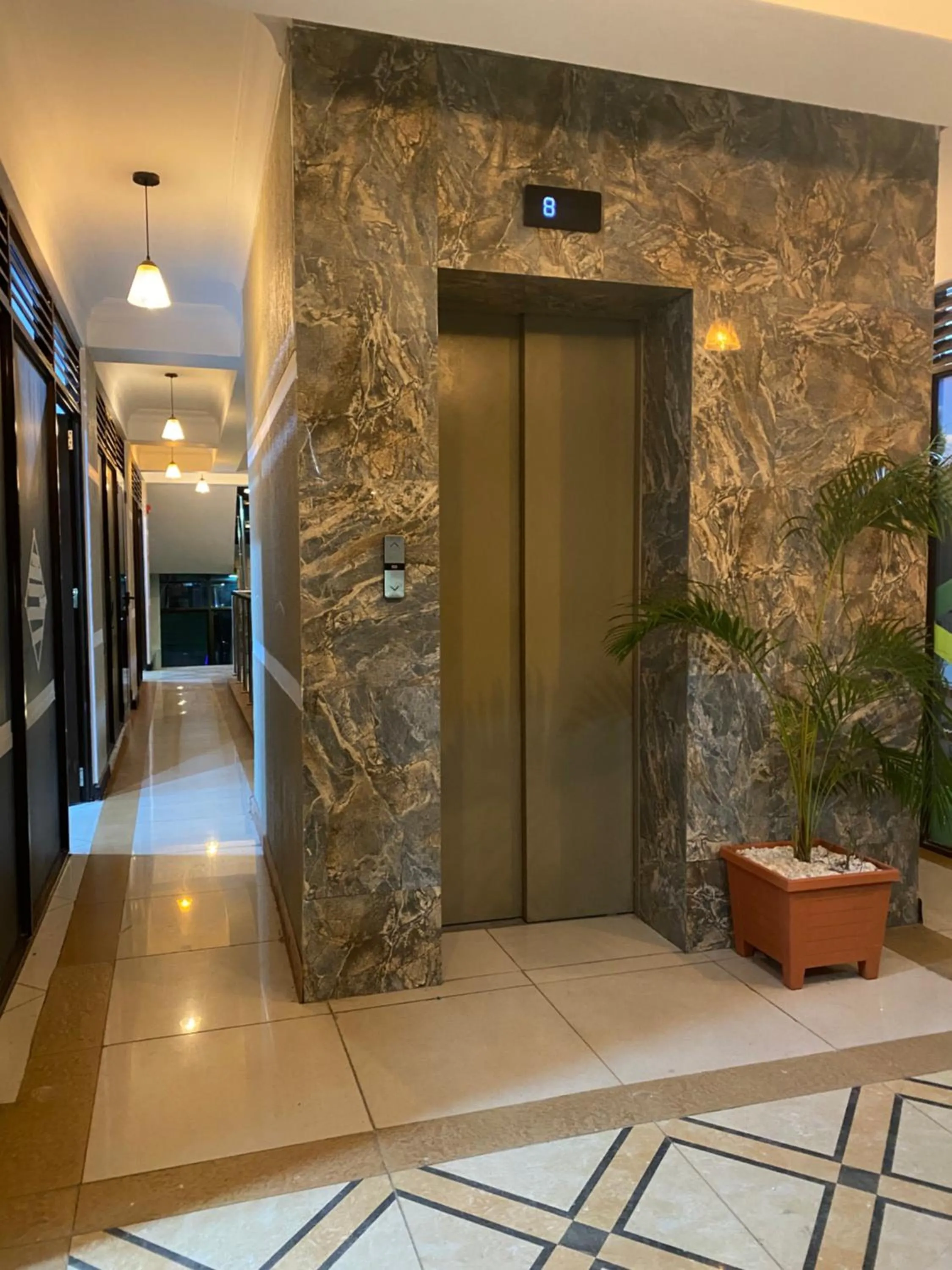 Facade/entrance, Bathroom in Hemak Suites