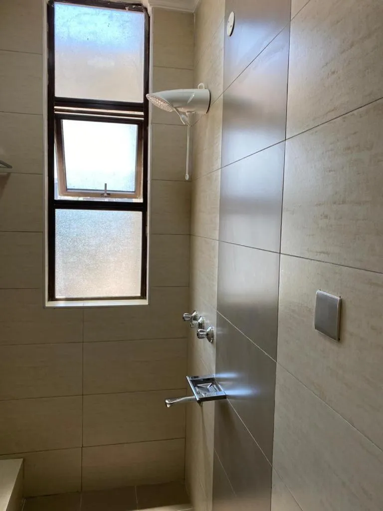 Bathroom in Hemak Suites