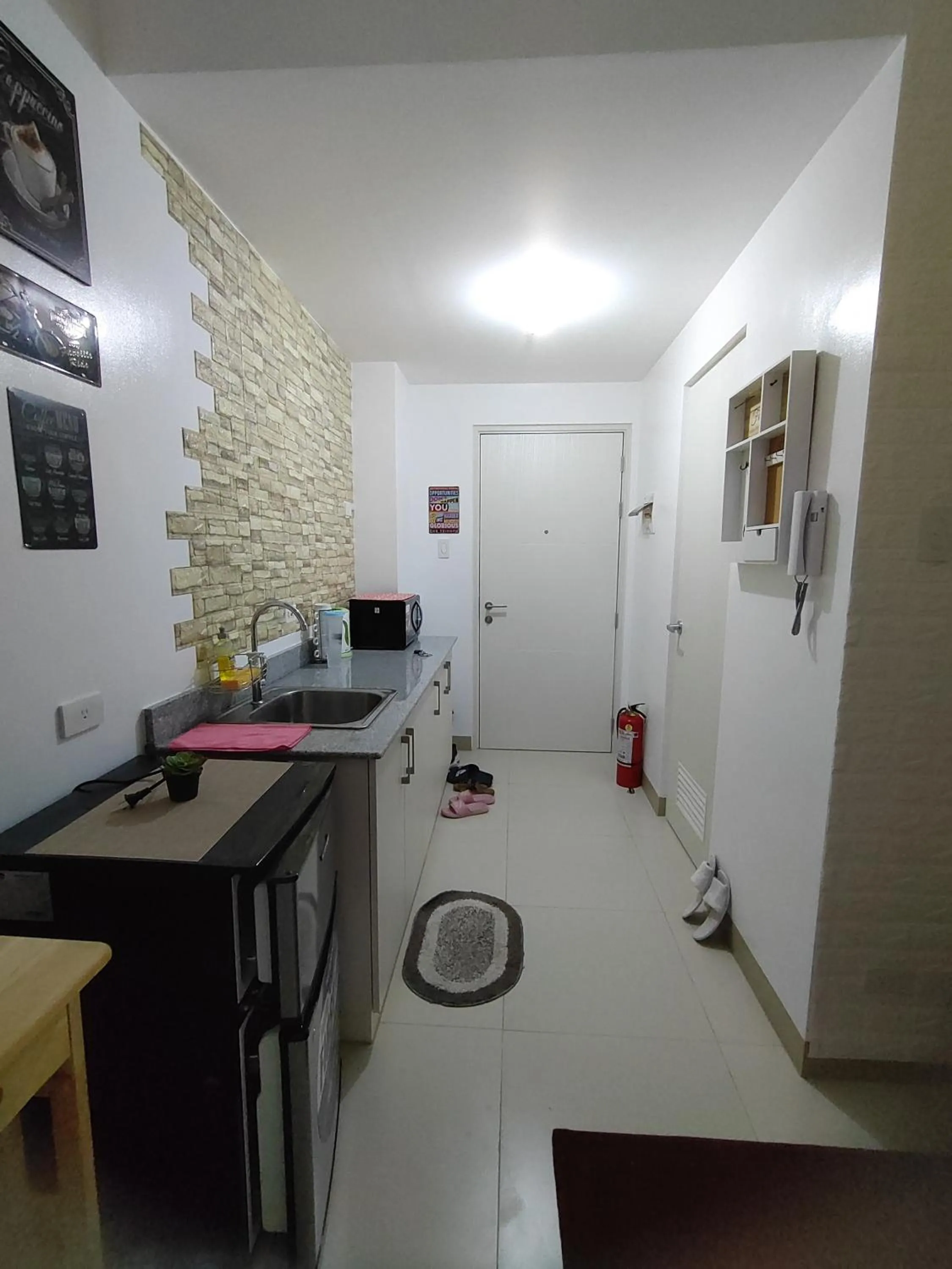 kitchen in R&A Staycation at Wind Residence