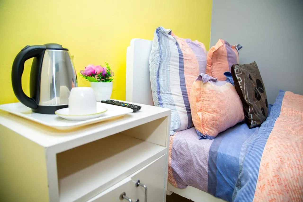 Bed in Relaxing Guest House in th Heart of Ndabeni