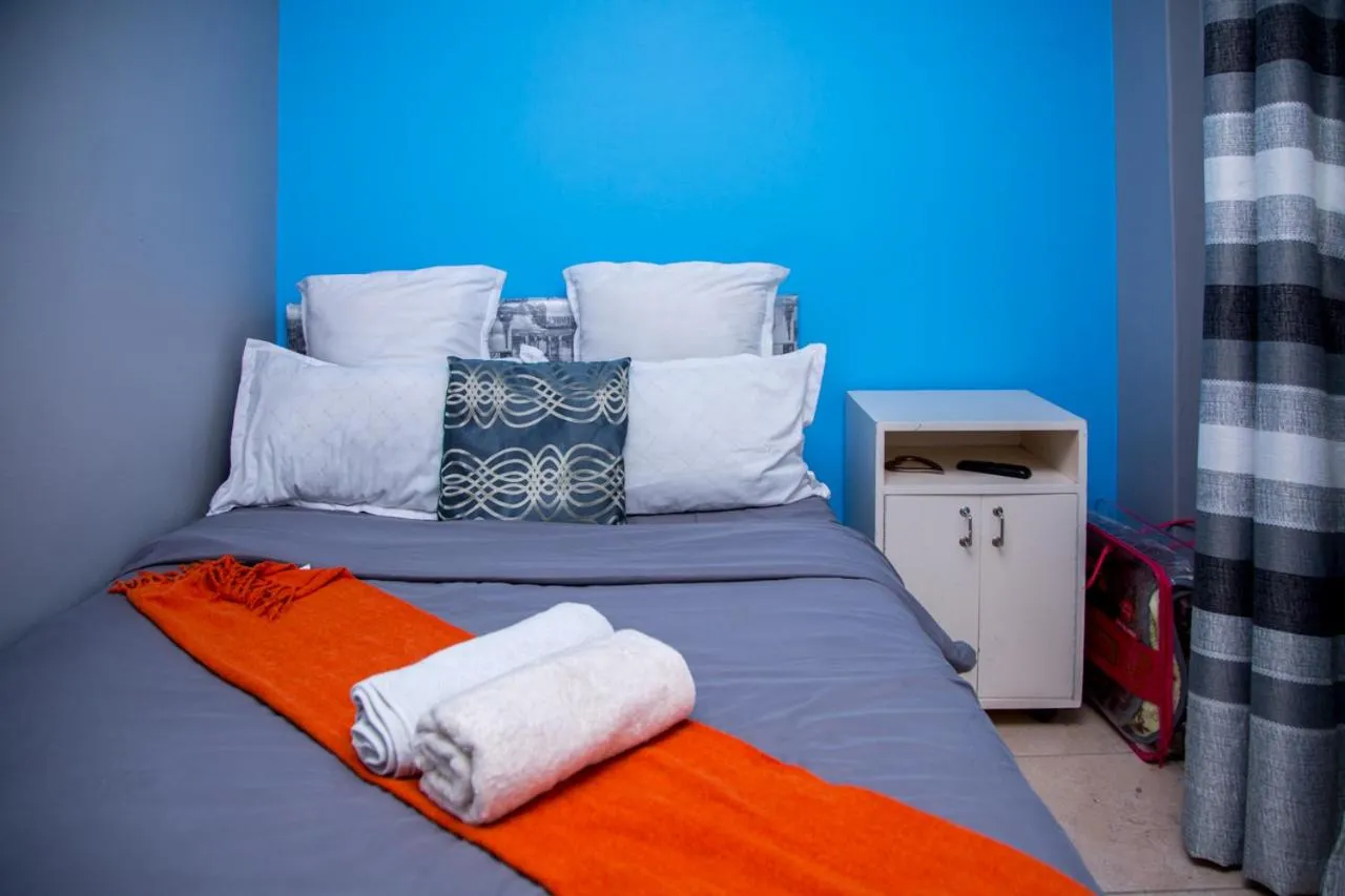 Bed in Relaxing Guest House in th Heart of Ndabeni