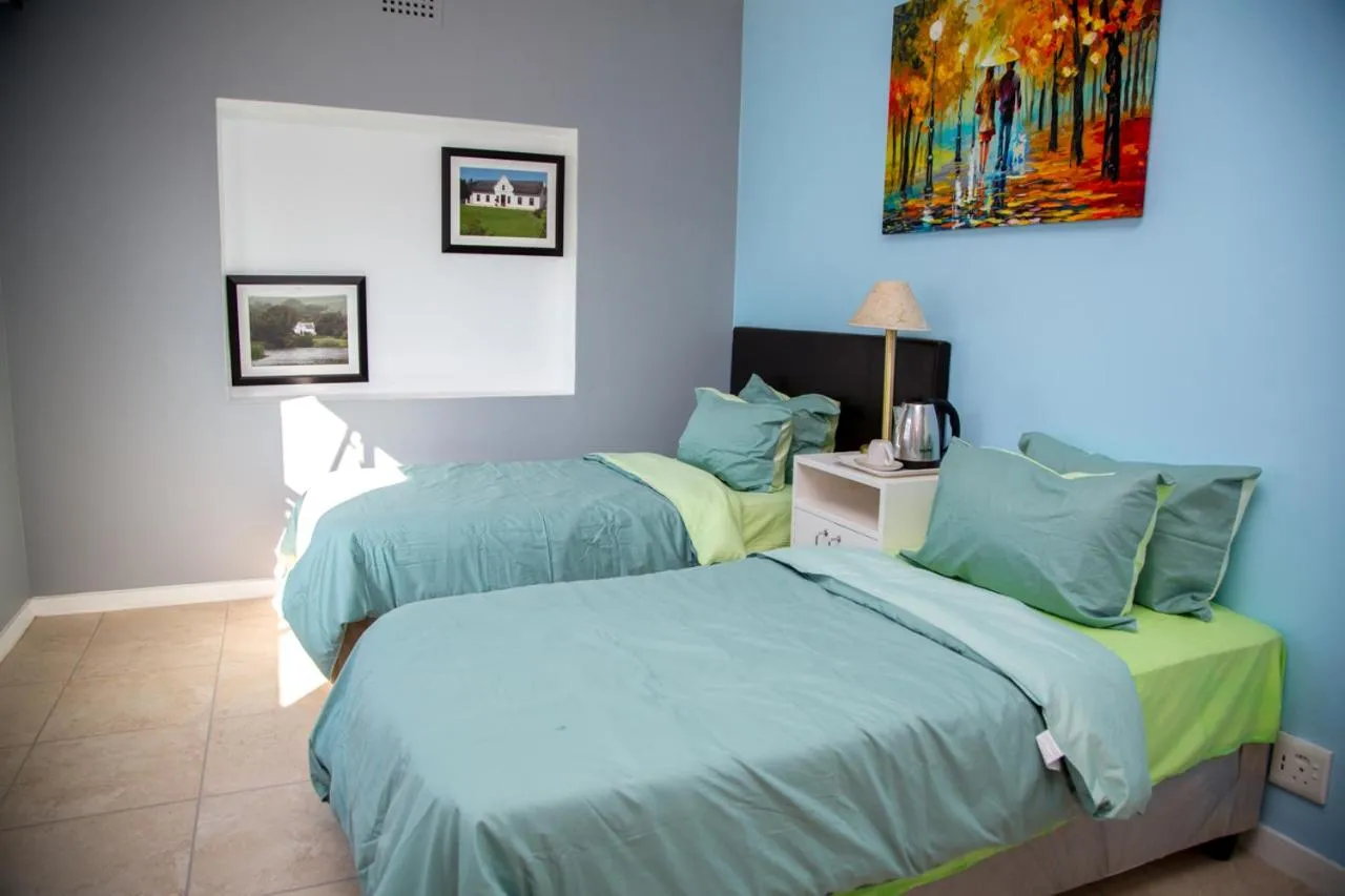 Bed in Relaxing Guest House in th Heart of Ndabeni