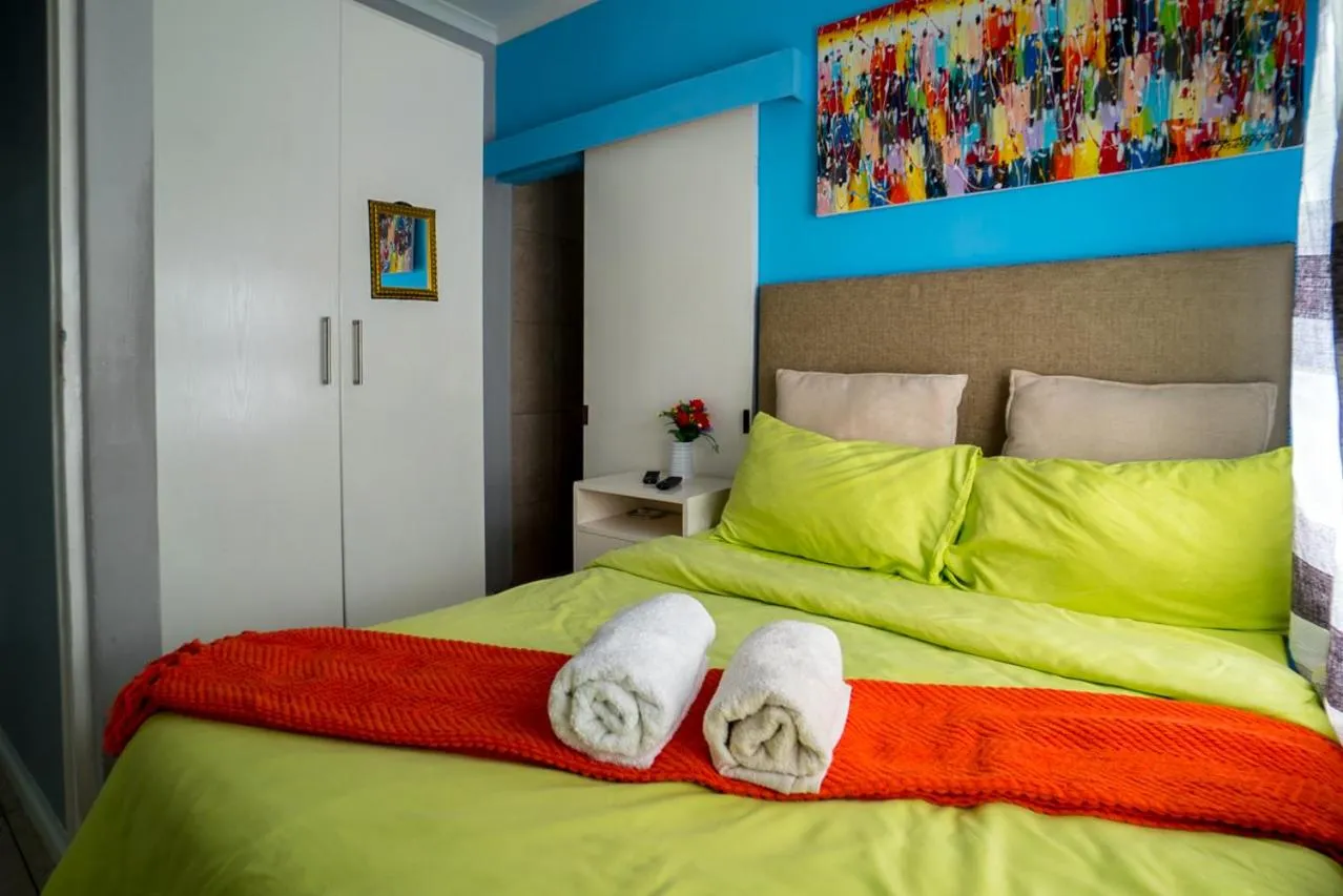 Bed in Relaxing Guest House in th Heart of Ndabeni