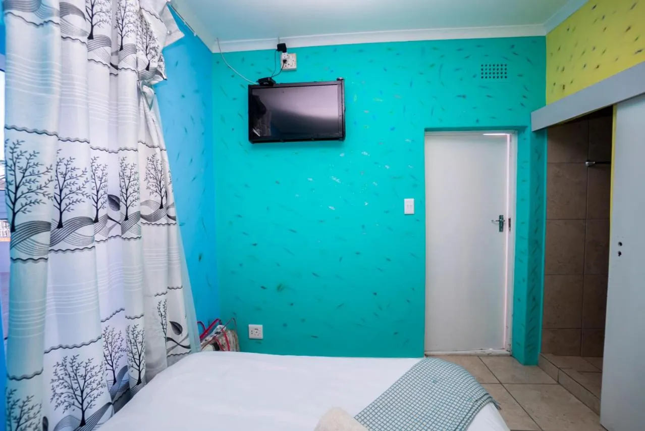 Bed in Relaxing Guest House in th Heart of Ndabeni