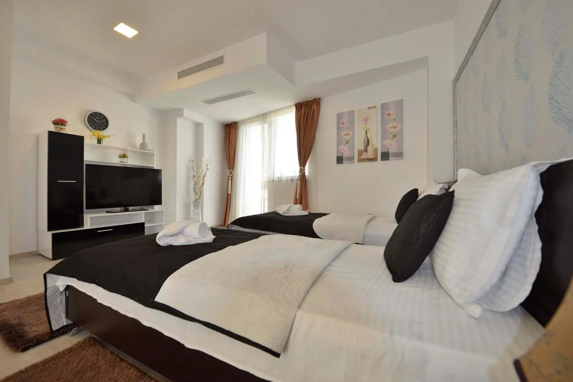 Bed in AMADEUS RESIDENCE