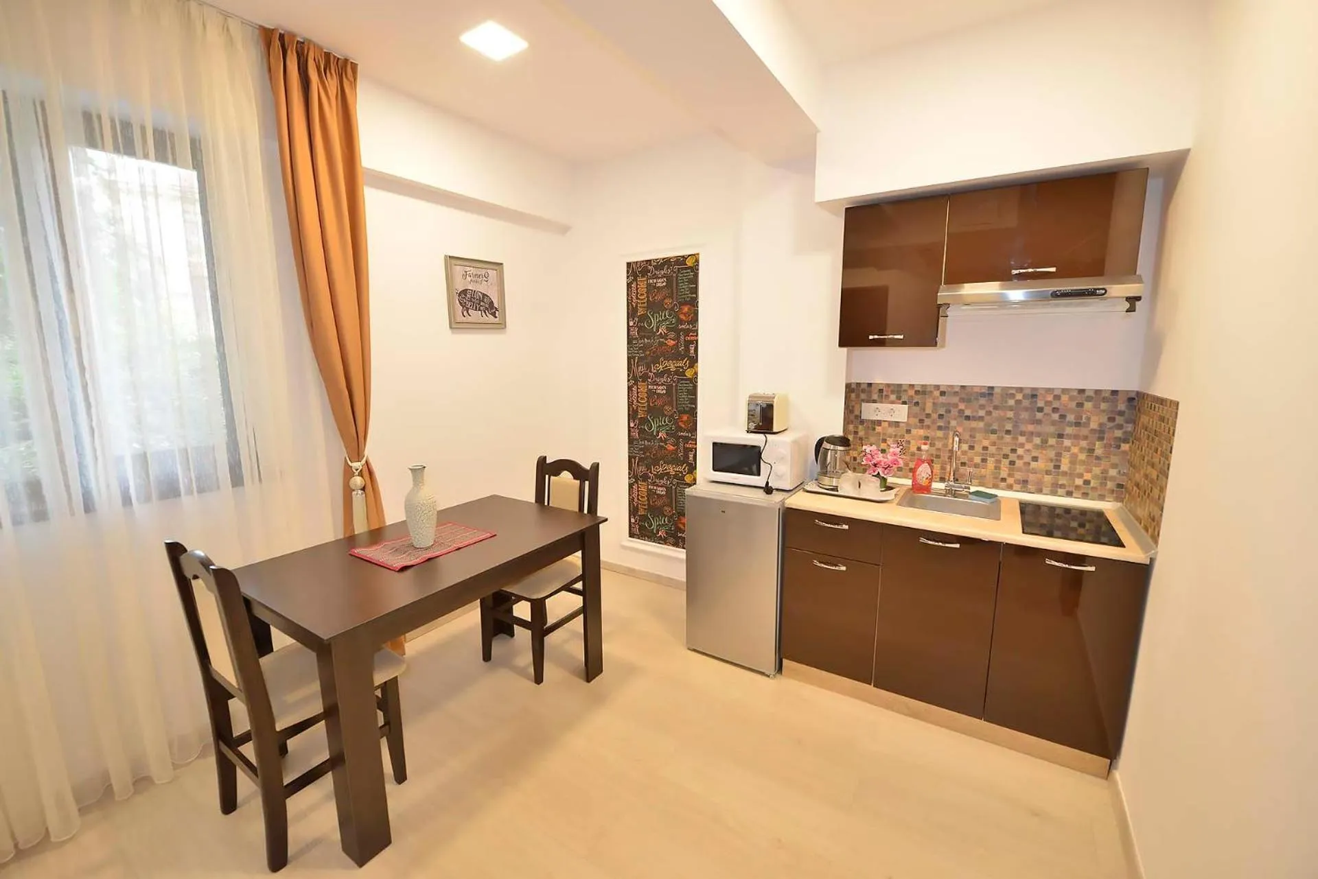 Kitchen or kitchenette in AMADEUS RESIDENCE